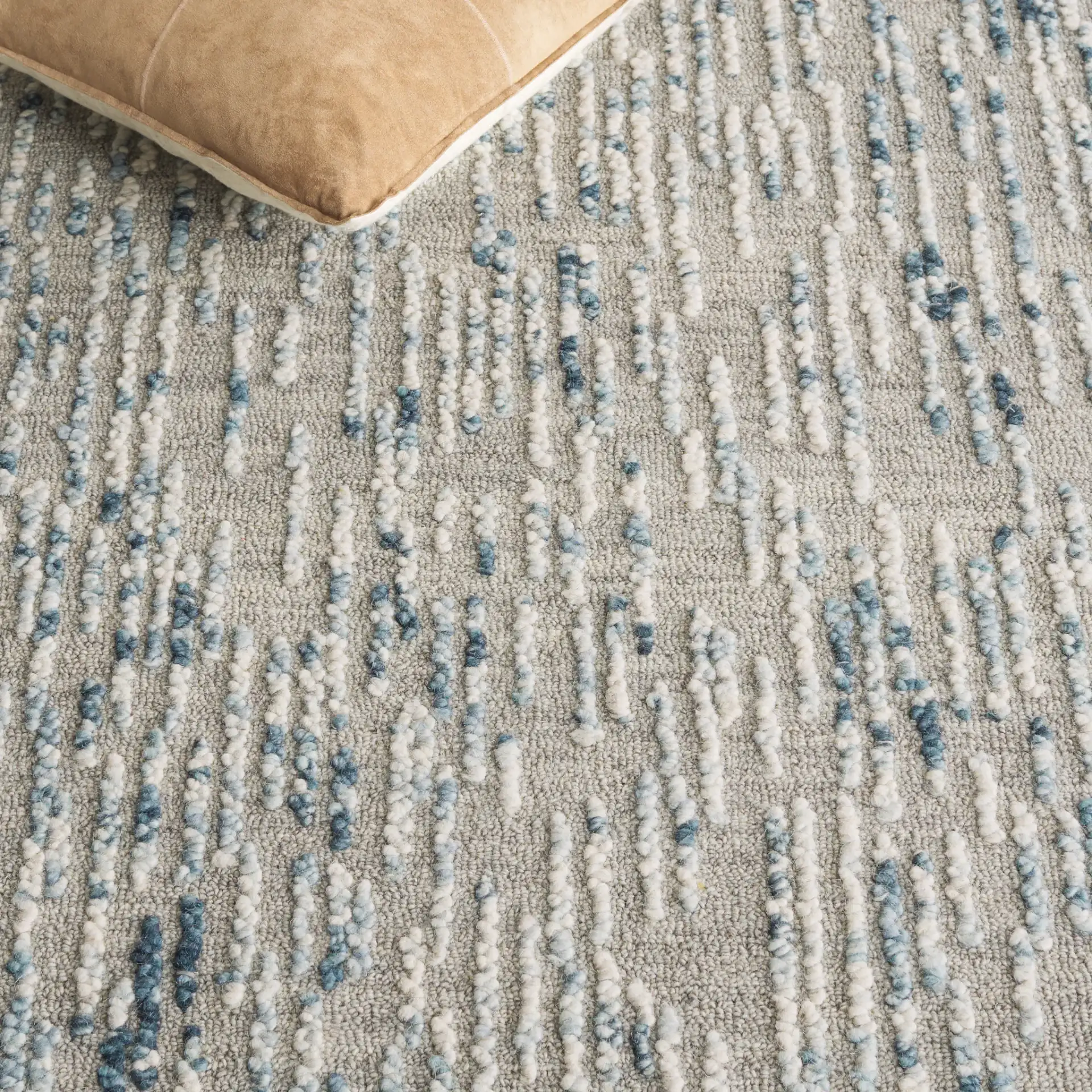 Abstract Dashed Stripe Hand-Tufted Wool Rug in Gray / Blue in a styled room