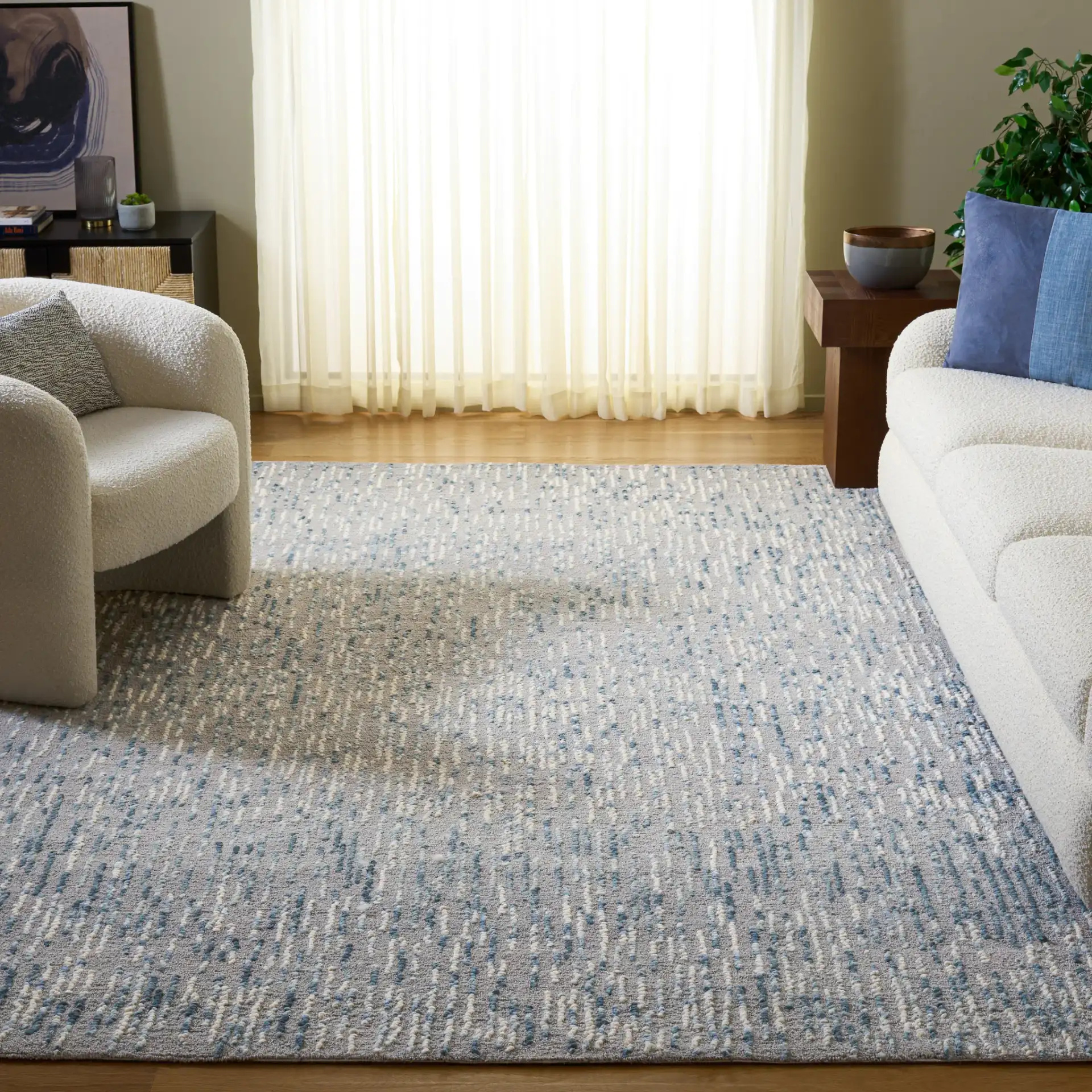 Abstract Dashed Stripe Hand-Tufted Wool Rug in Gray / Blue in a styled room