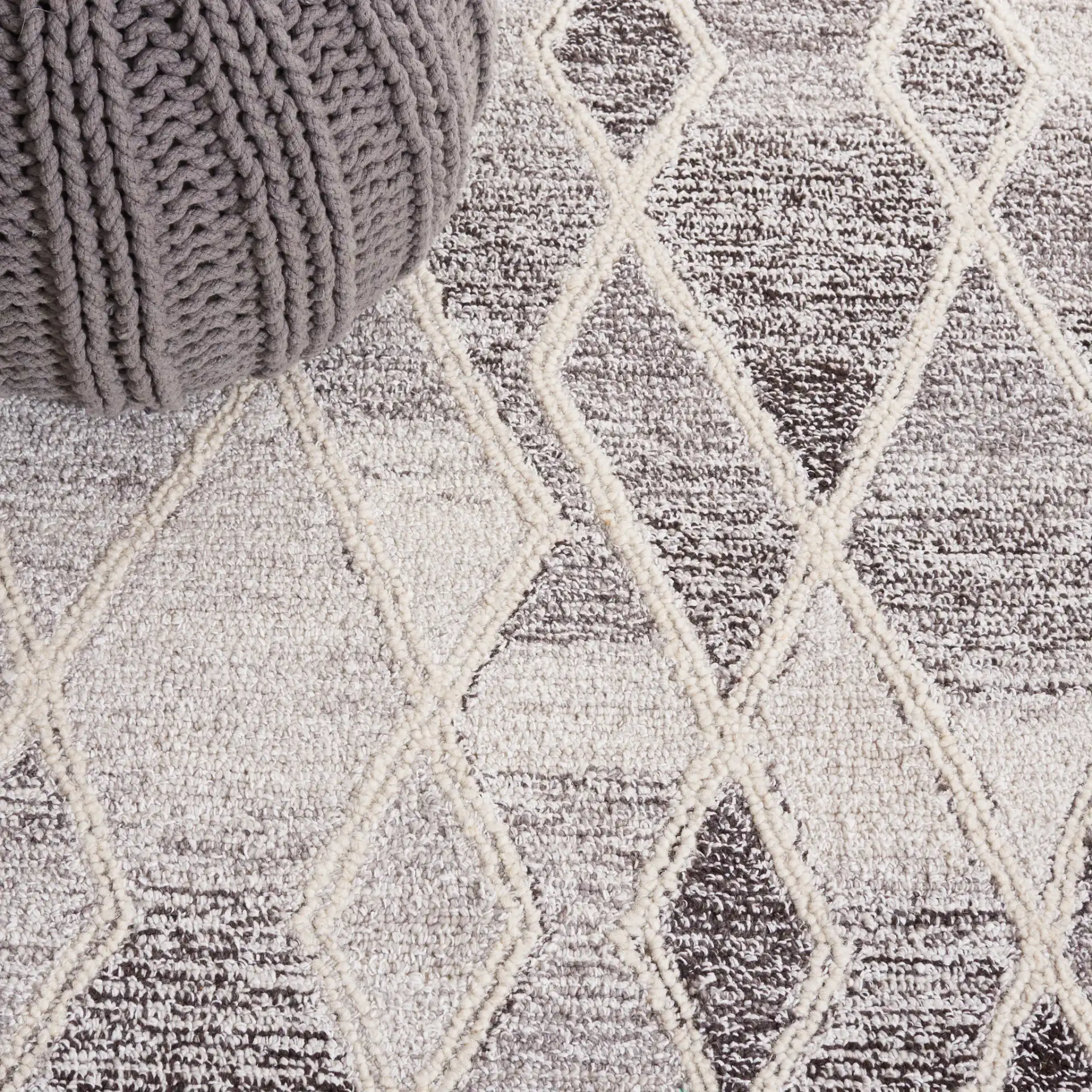 Abstract Boho Bordered Diamond Hand-Tufted Wool Rug in Ivory / Gray in a styled room