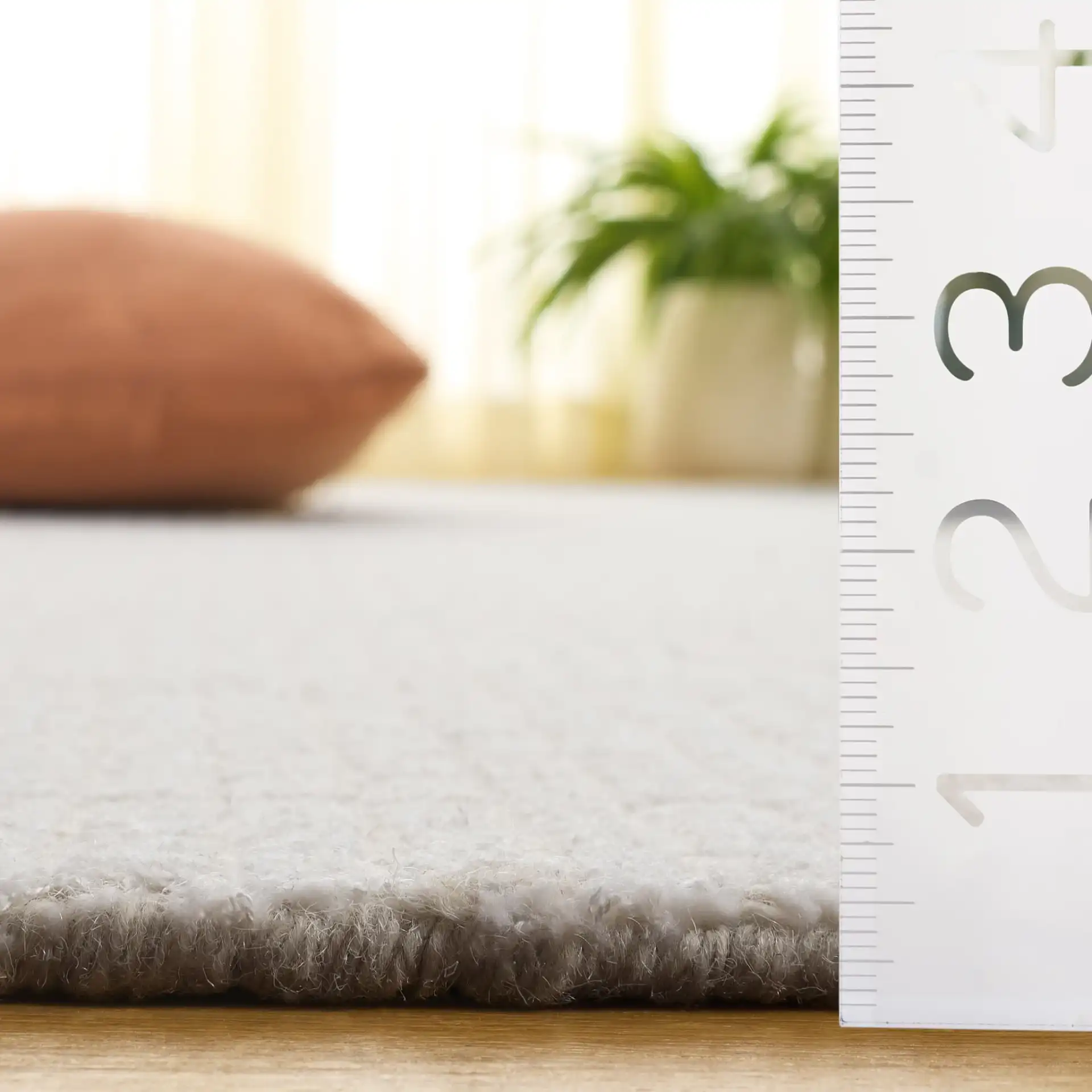 Abstract Solid Grid Hand-Tufted Rug in Ivory in a styled room