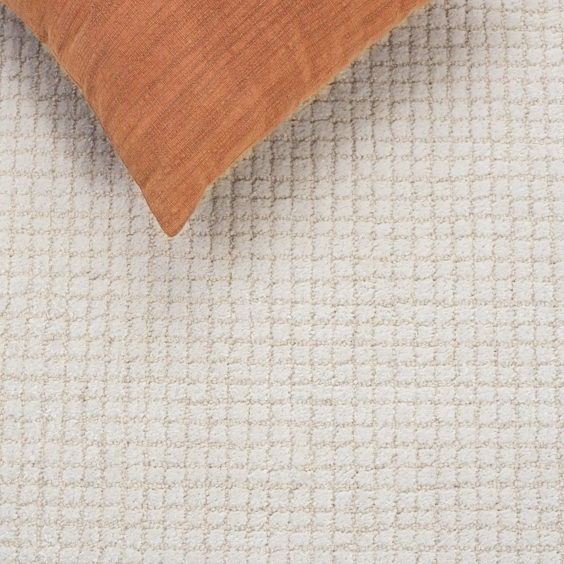 Abstract Solid Grid Hand-Tufted Rug in Ivory in a styled room