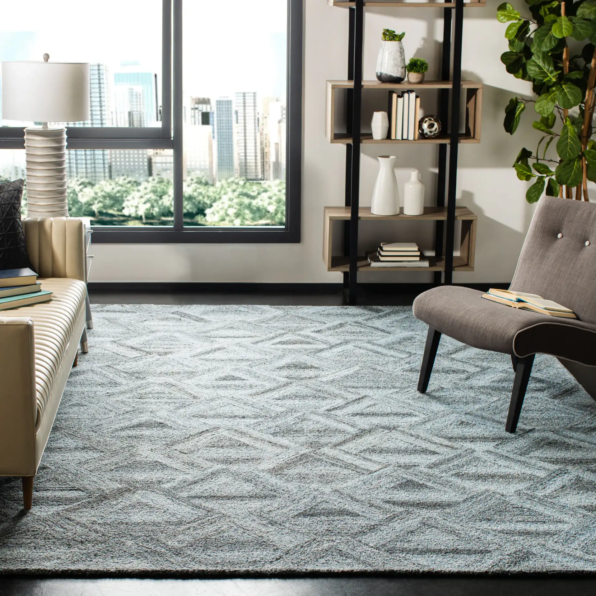 Abstract Triangle Hand-Tufted Wool Blend Rug in Blue / Black in a styled room