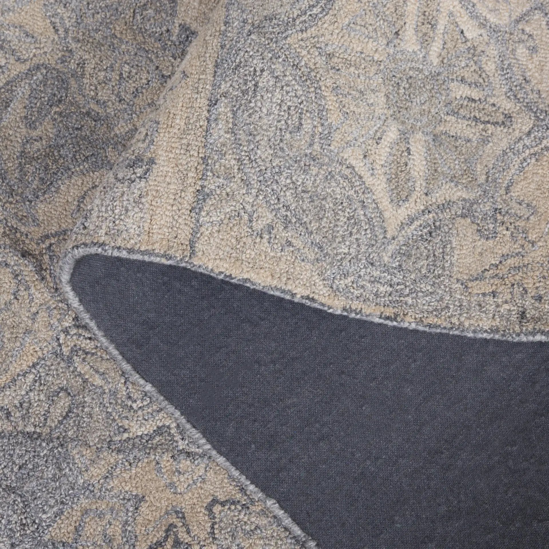 Abstract Transitional Distressed Hand-Tufted Rug in Beige / Gray in a styled room