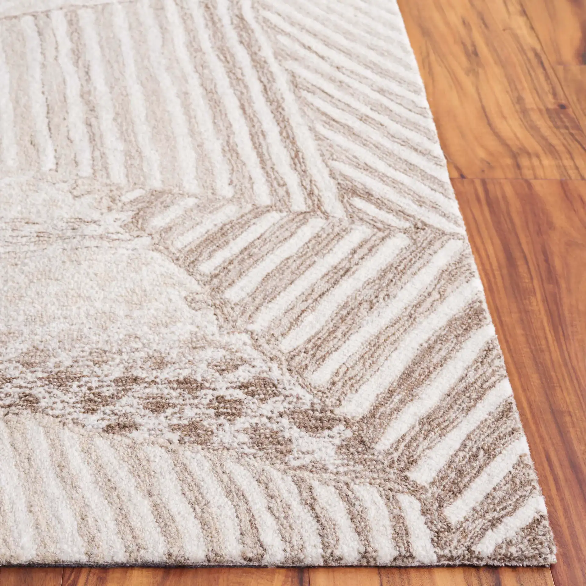 Abstract Abstract Geometric Patchwork Hand-Tufted Wool Rug in Ivory / Light Brown in a styled room