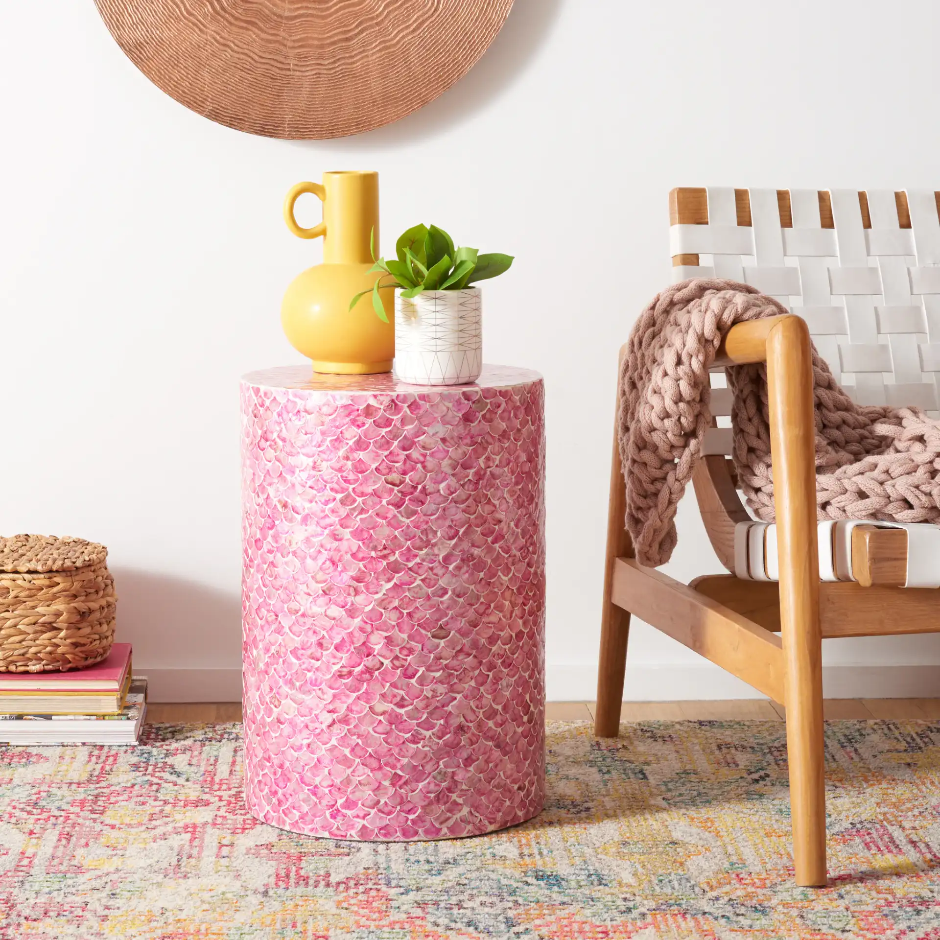 Emberlyn Round Accent Table in Pink in a styled room
