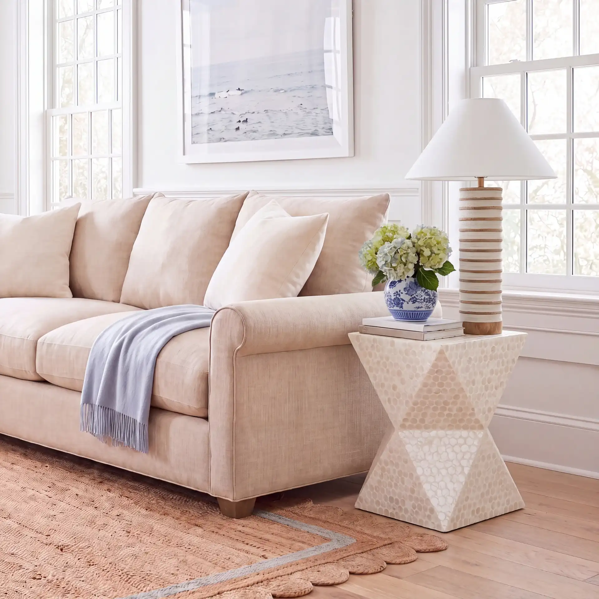 Milan Accent Table in White in a styled room
