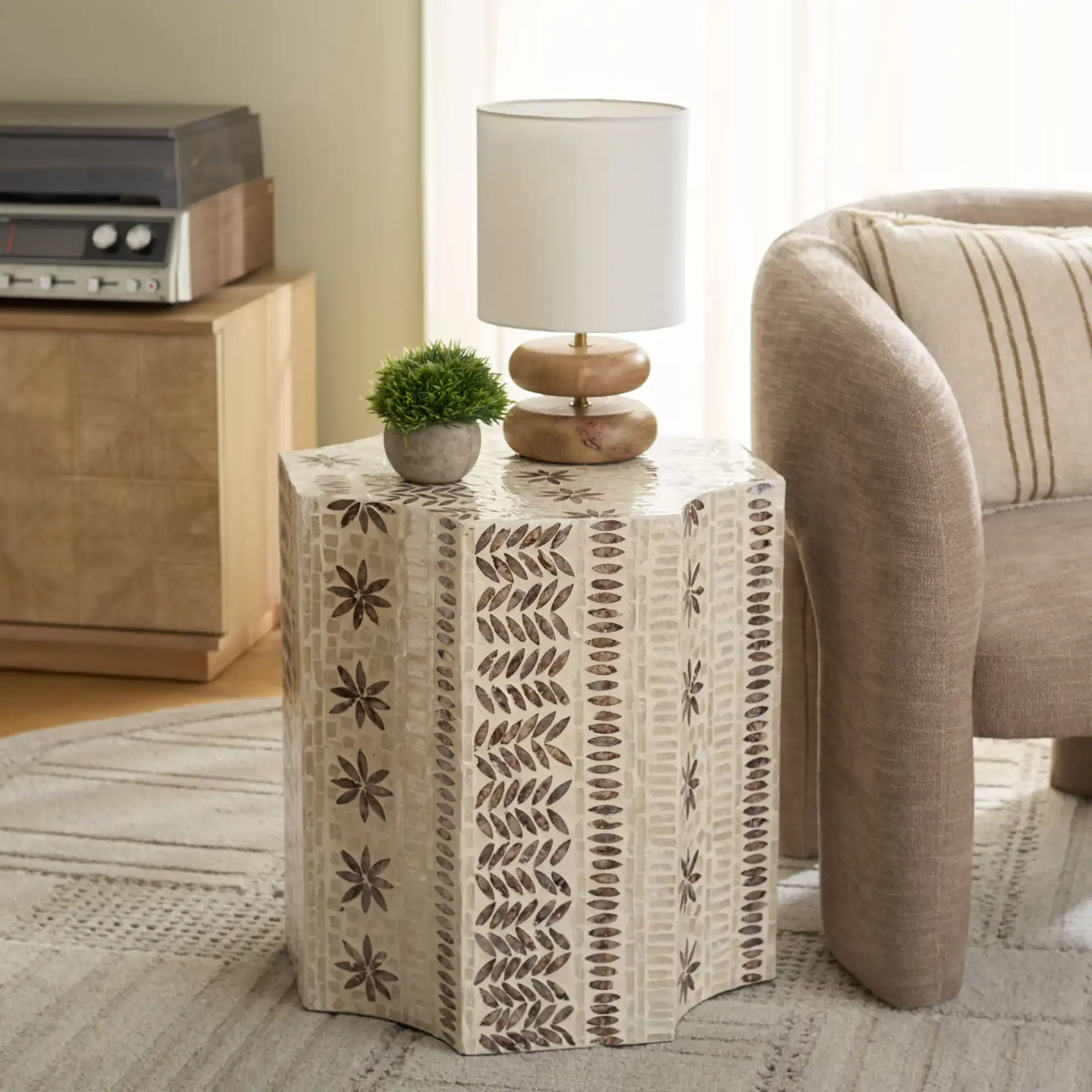 Tuley Accent Table in White / Gold in a styled room