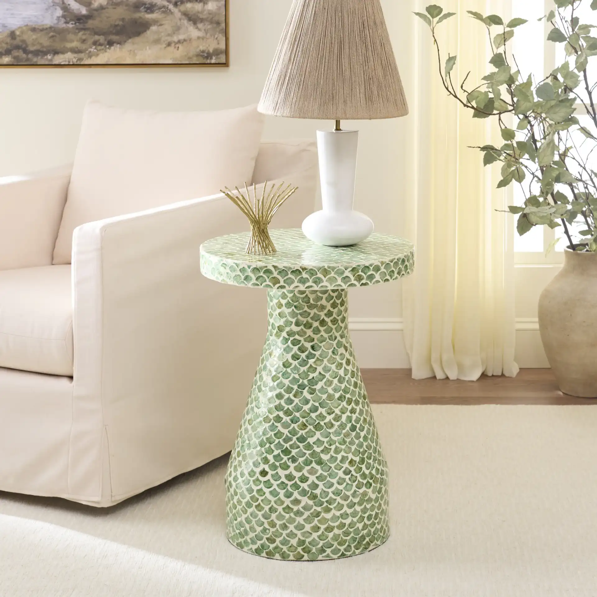 Ondrea Accent Table in Green / White in a styled room