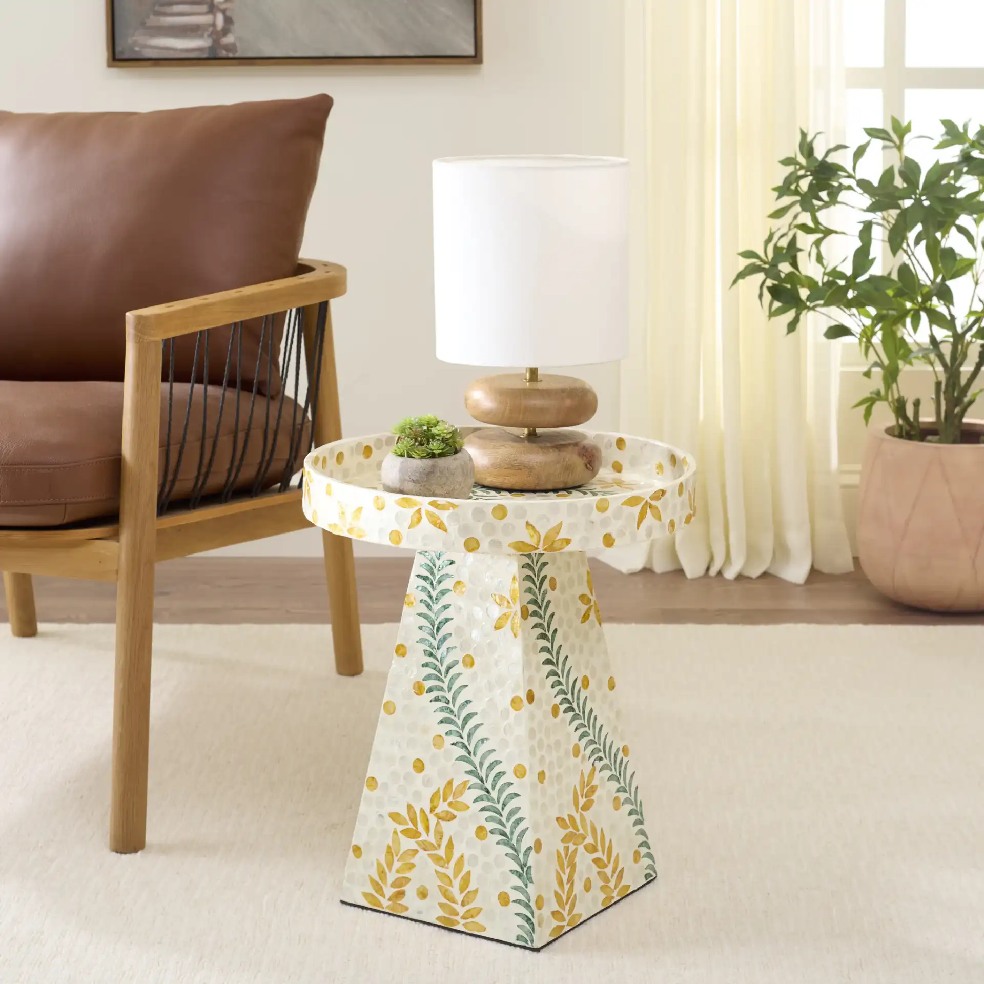 Manuela Accent Table in White / Multi in a styled room