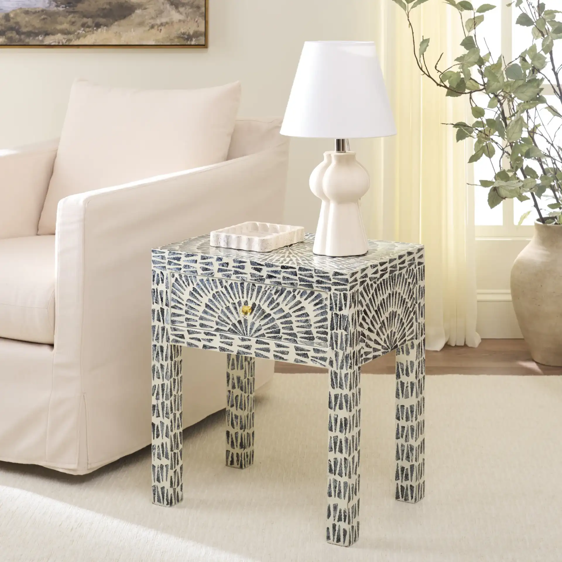 Euan Accent Table with Drawer in Black / White in a styled room