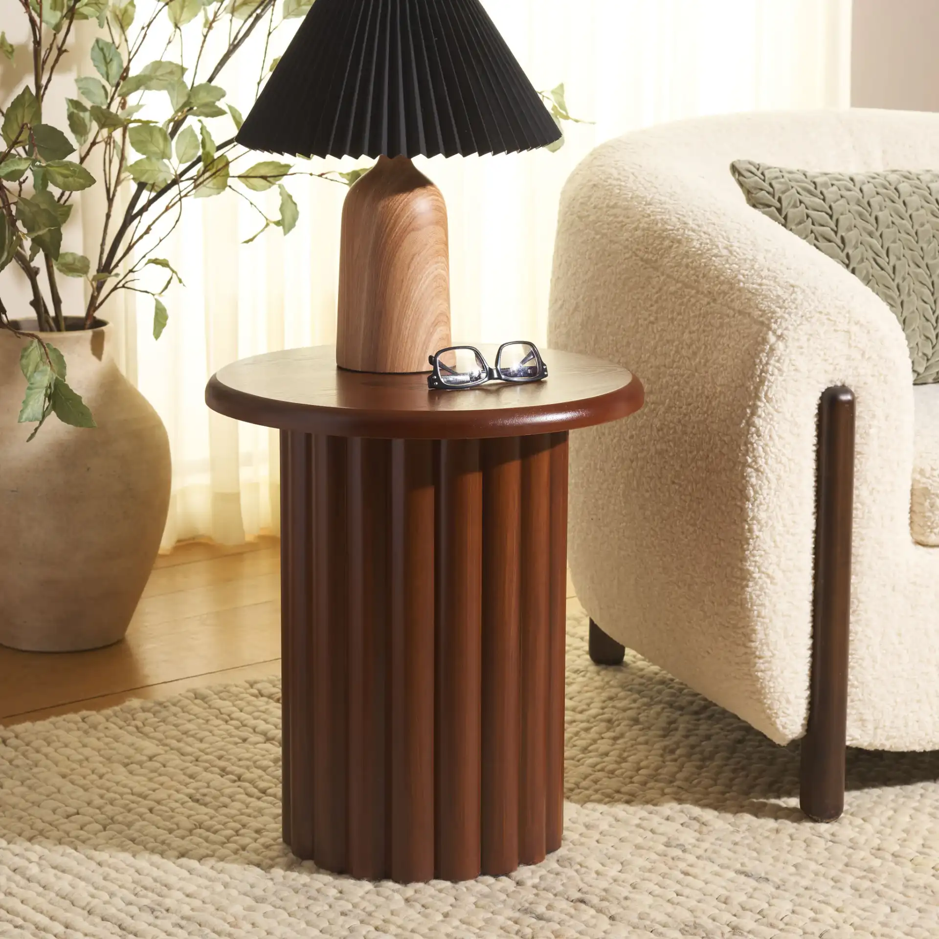 Monka Round End Table in Walnut in a styled room