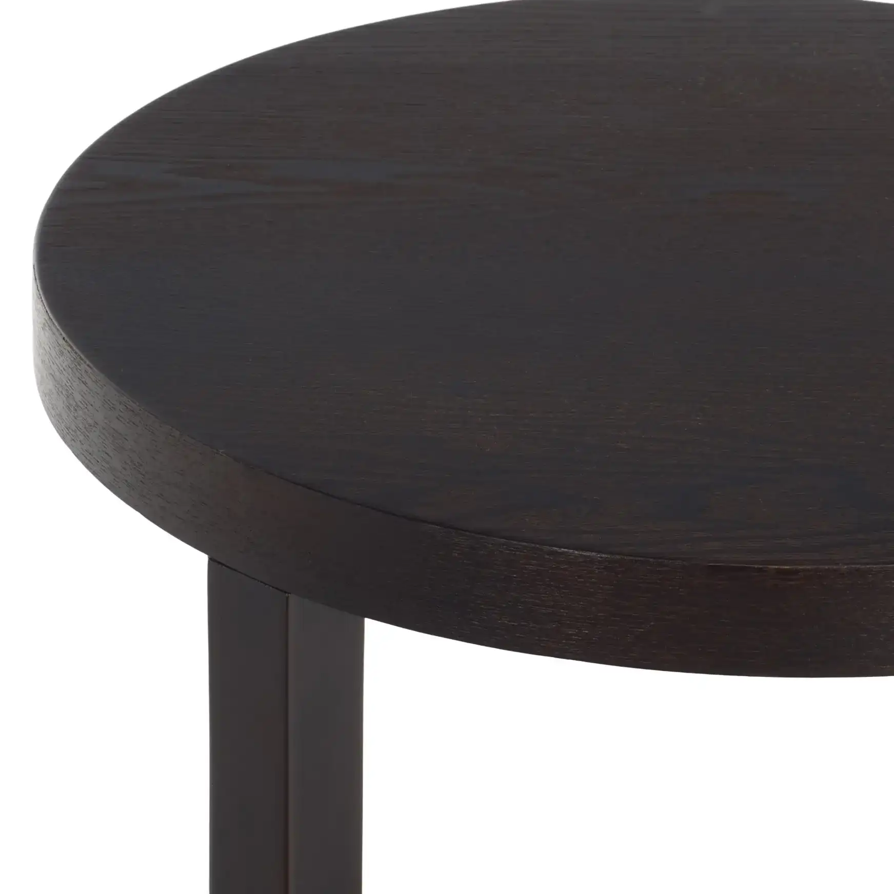 Najah Round Accent Table in Dark Brown in a styled room