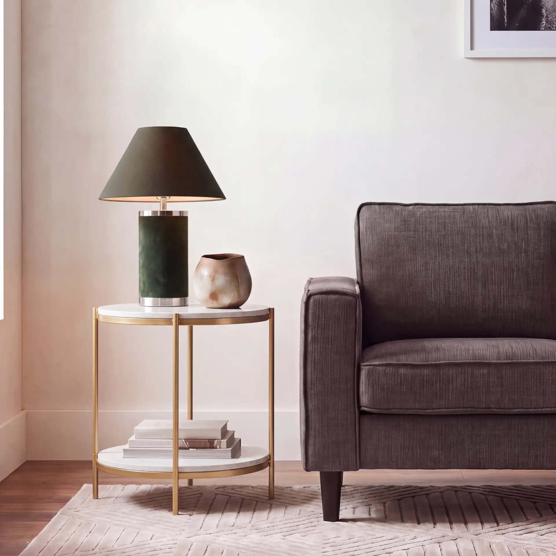 Dove End Table in White Faux Marble / Gold in a styled room
