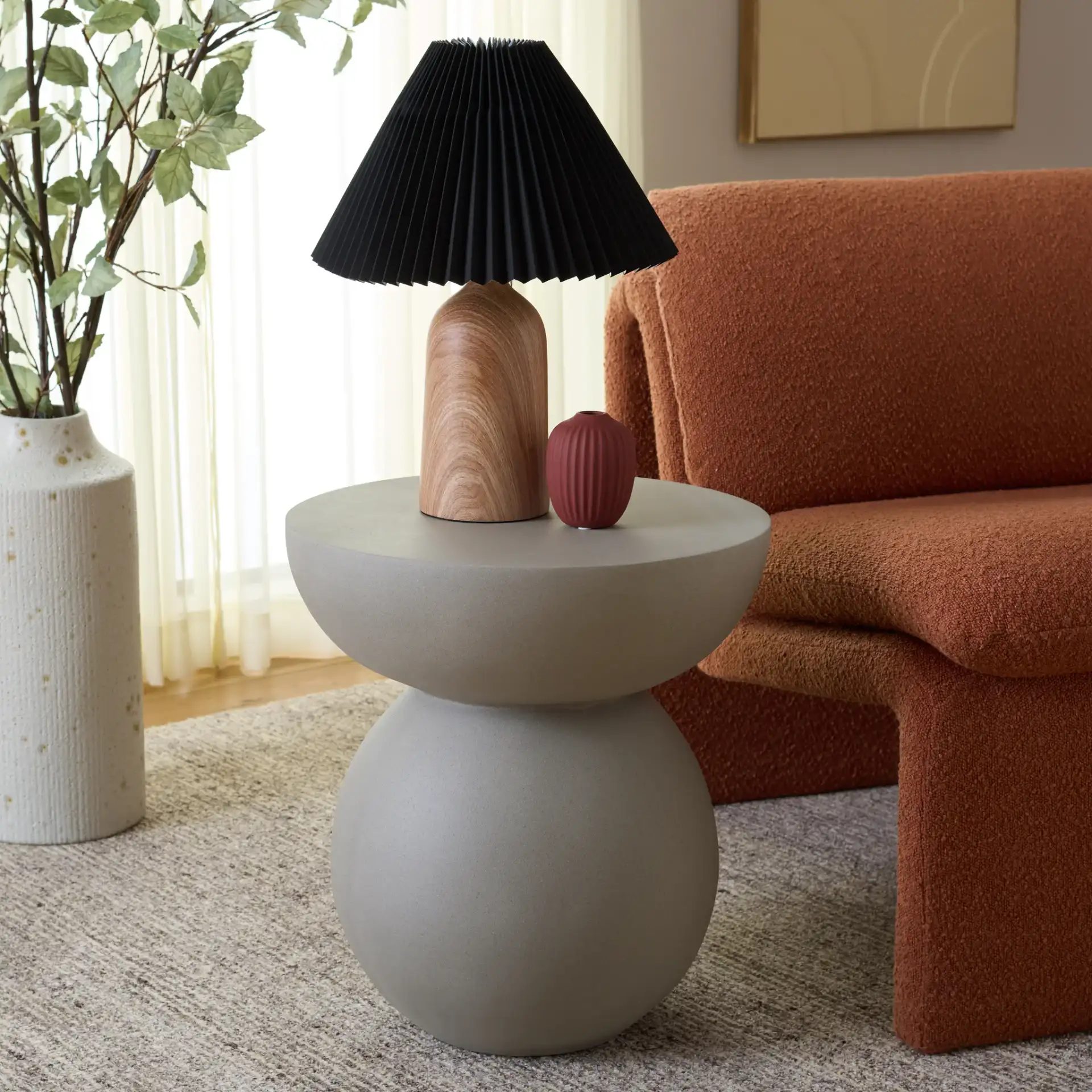 Ailani Accent Table in Gray in a styled room