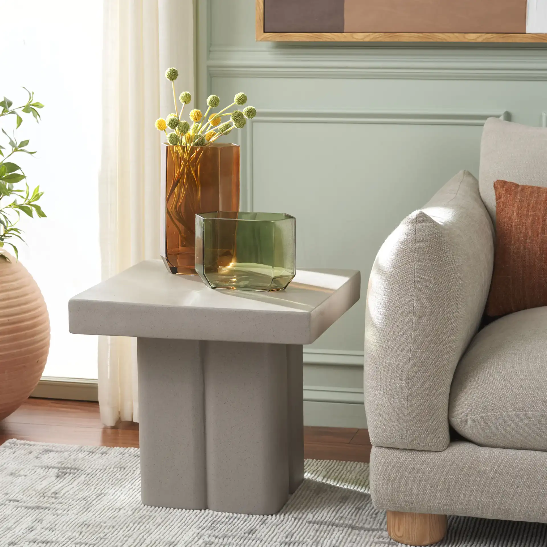 Oaklyn Square Accent Table in Gray in a styled room