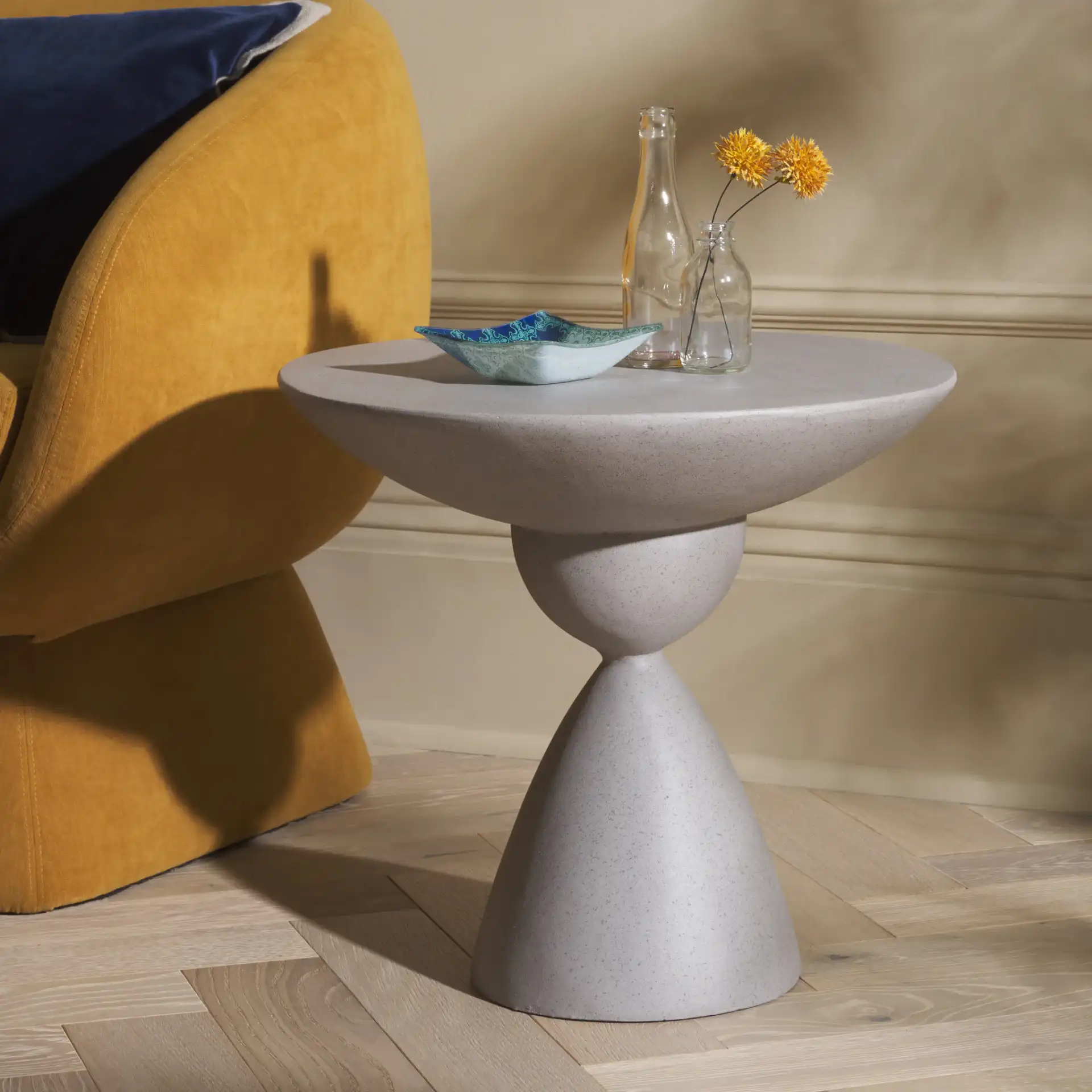 Atley Accent Table in Gray in a styled room