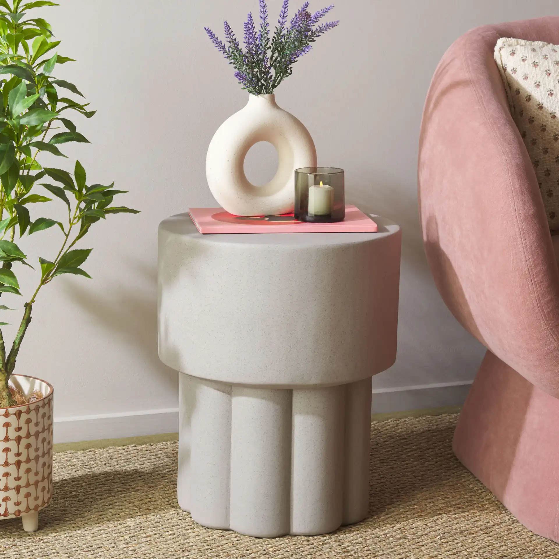 Eldrick Accent Table in Gray in a styled room