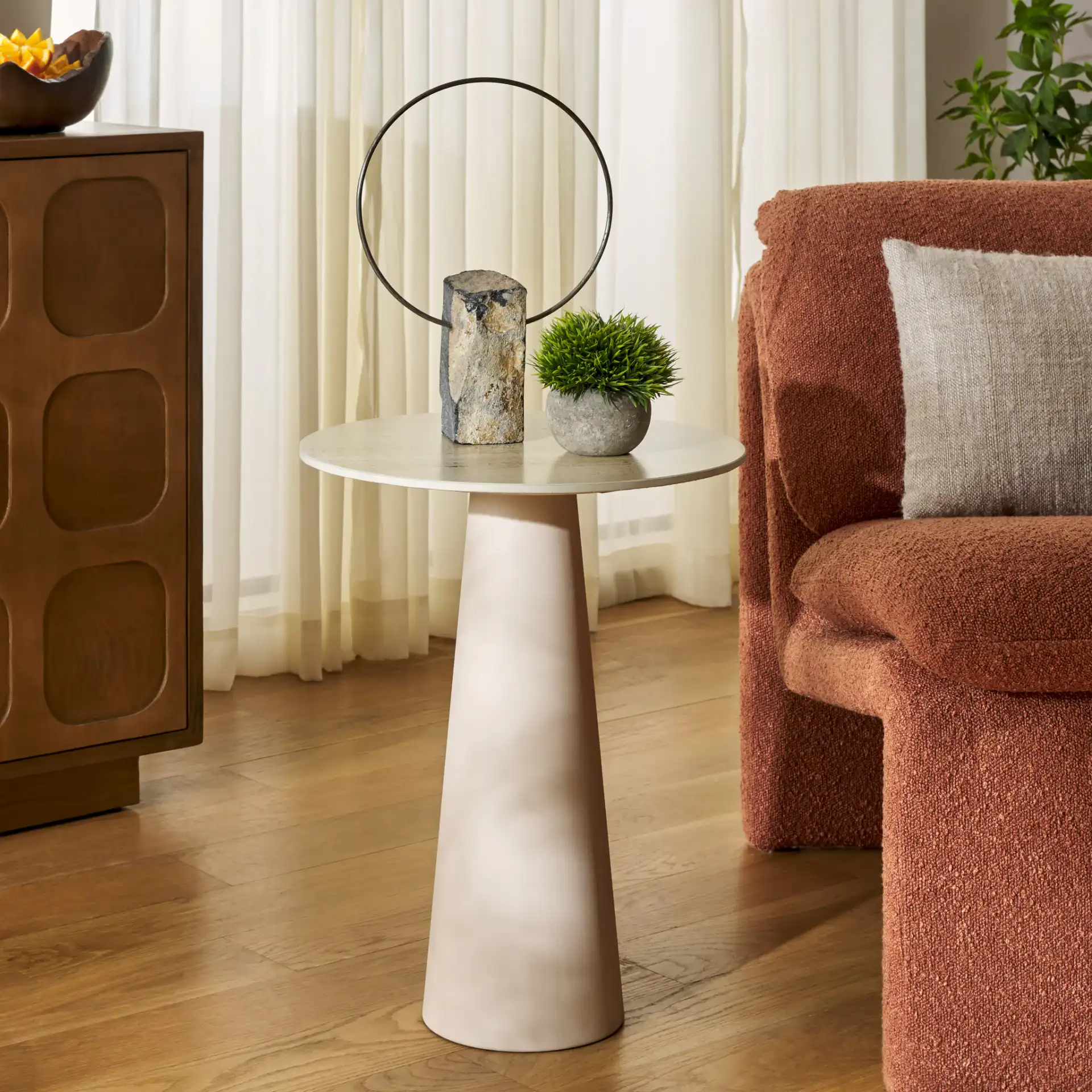 Nurem Short Ceramic Side Table in Beige Ceramic / Beige in a styled room