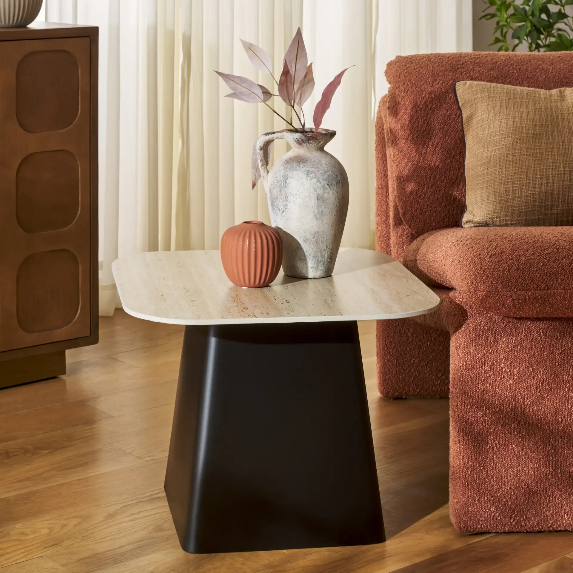 Fedo Porcelain Side Table in Beige / Black in a styled room