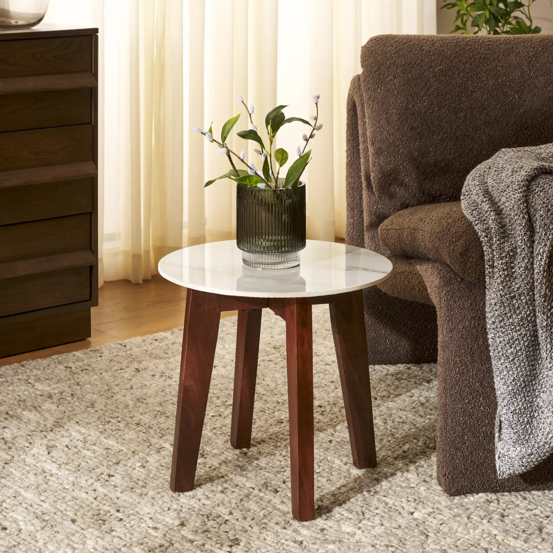 Helley Ceramic Accent Table in White Ceramic Faux Marble / Walnut in a styled room