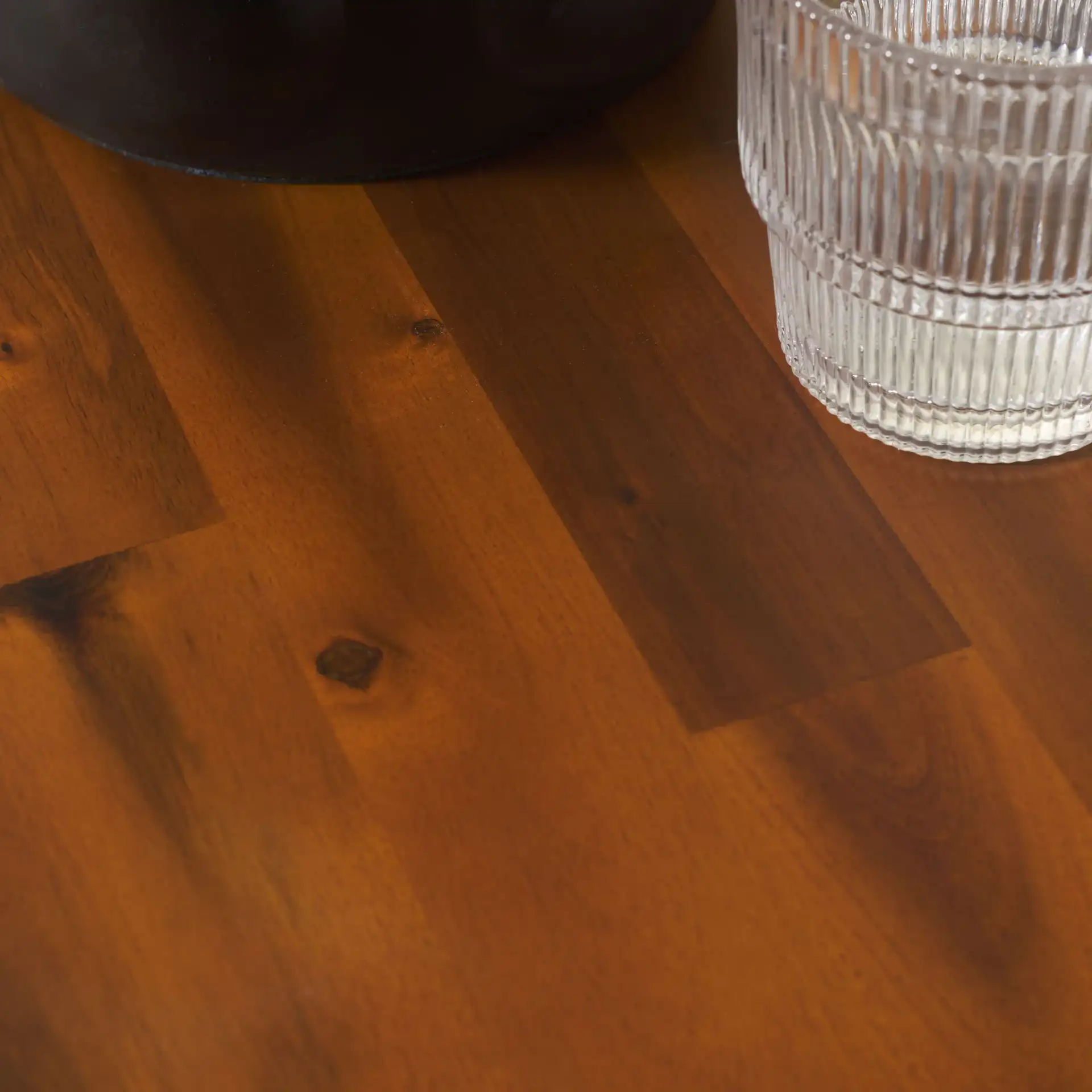 Benvolio Accent Table in Natural / Charcoal in a styled room