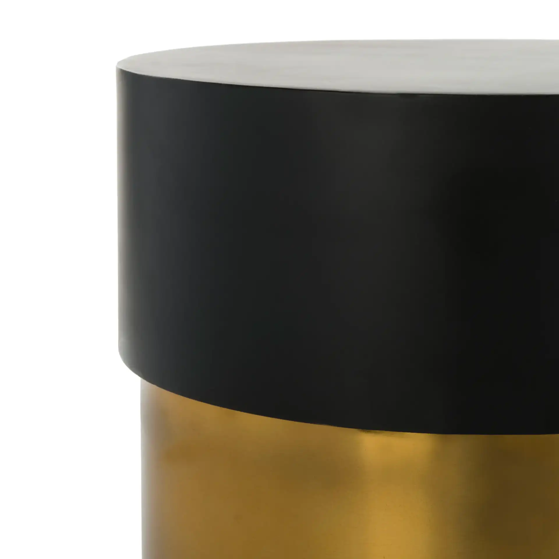 Solstice Round Side Table in Black / Gold in a styled room