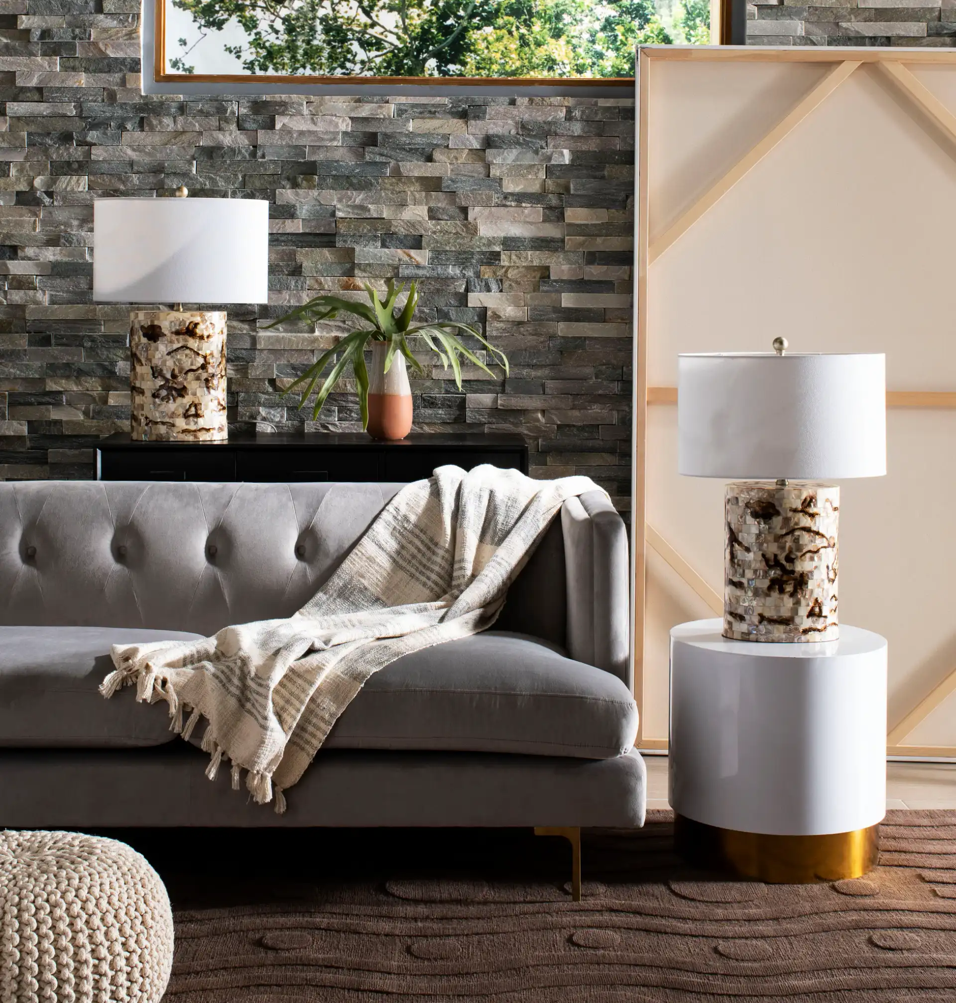 Angelo Round Side Table in White / Gold in a styled room