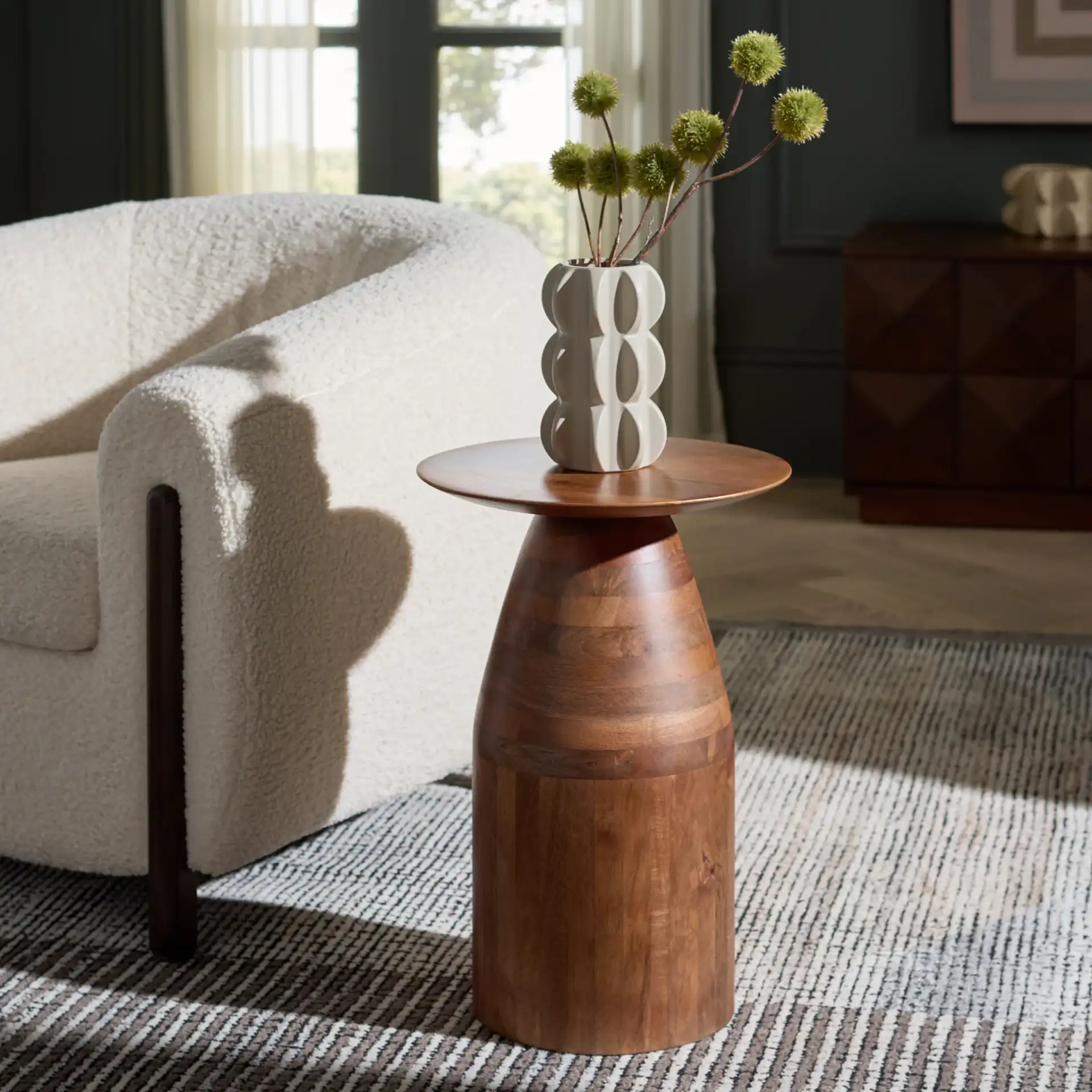Karu Accent Table in Walnut in a styled room