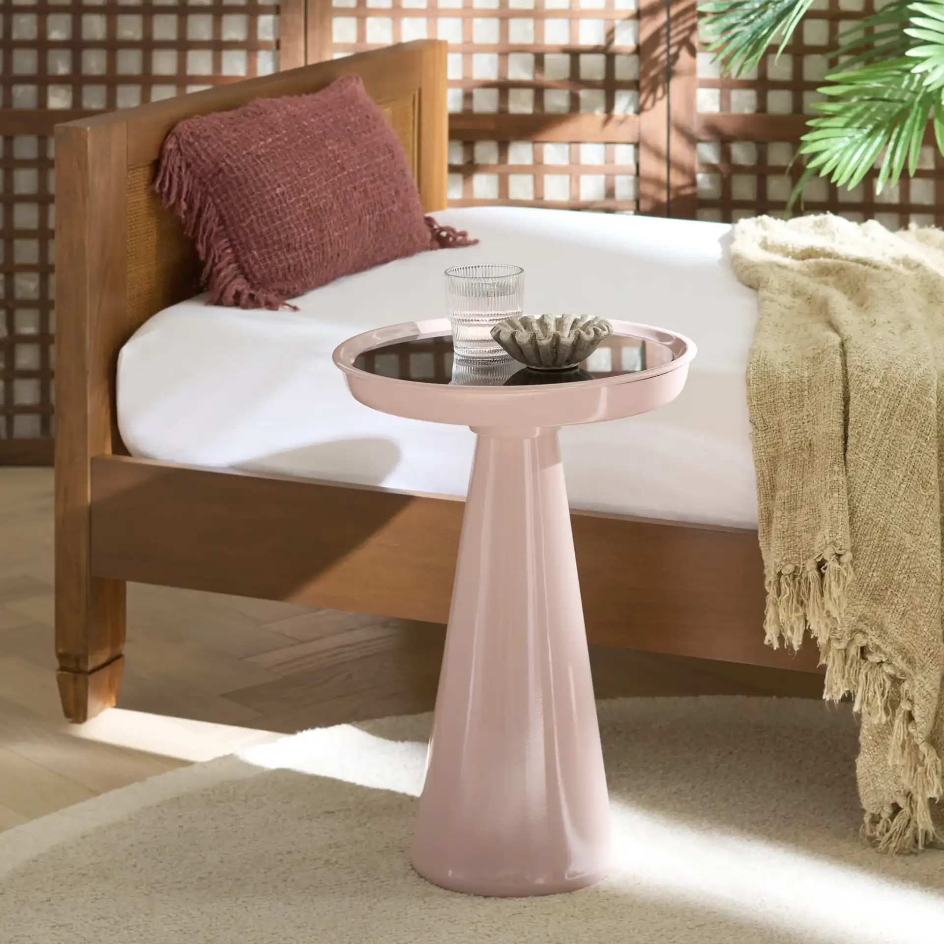 Hikuma Accent Table in Black / Taupe in a styled room