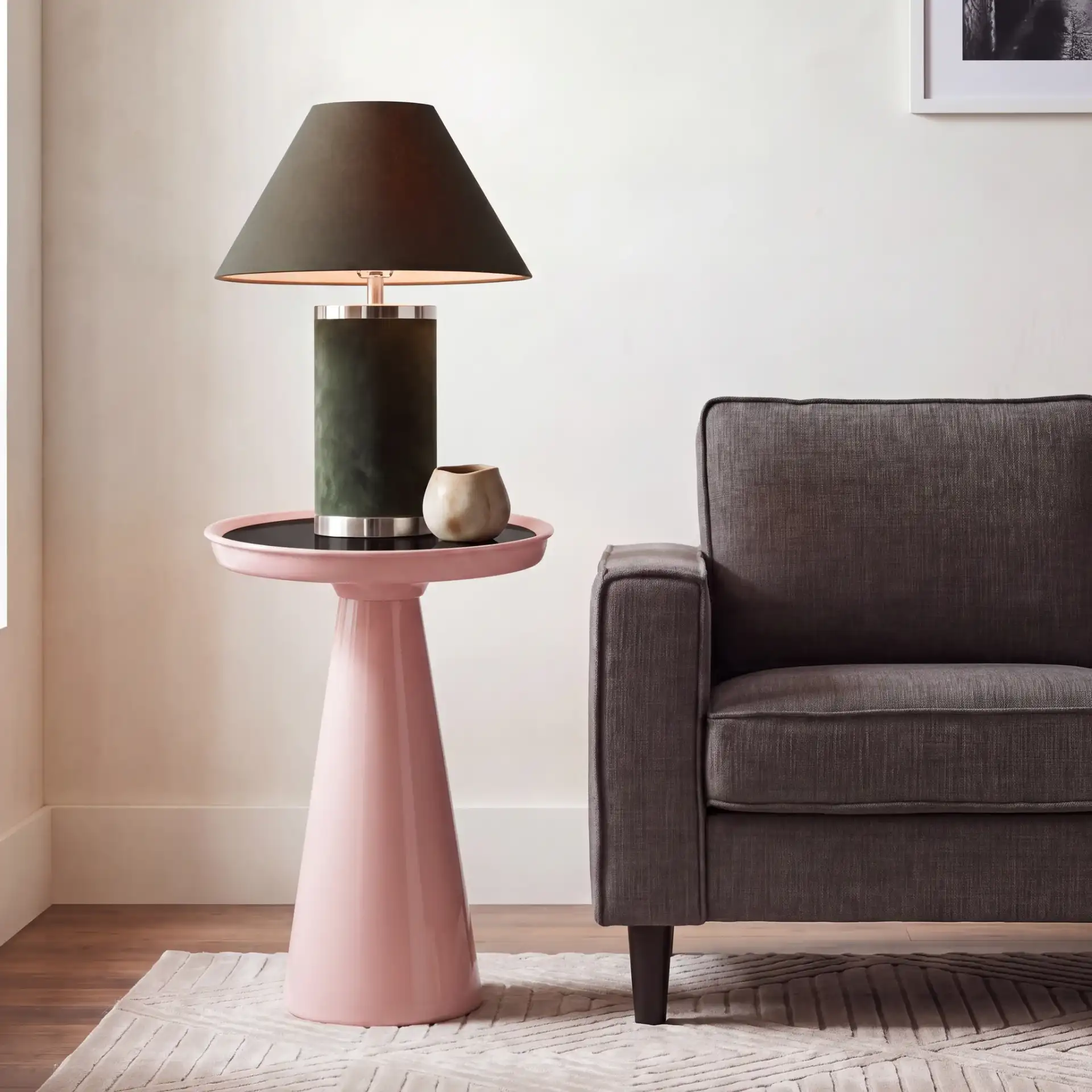 Hikuma Accent Table in Black / Taupe in a styled room