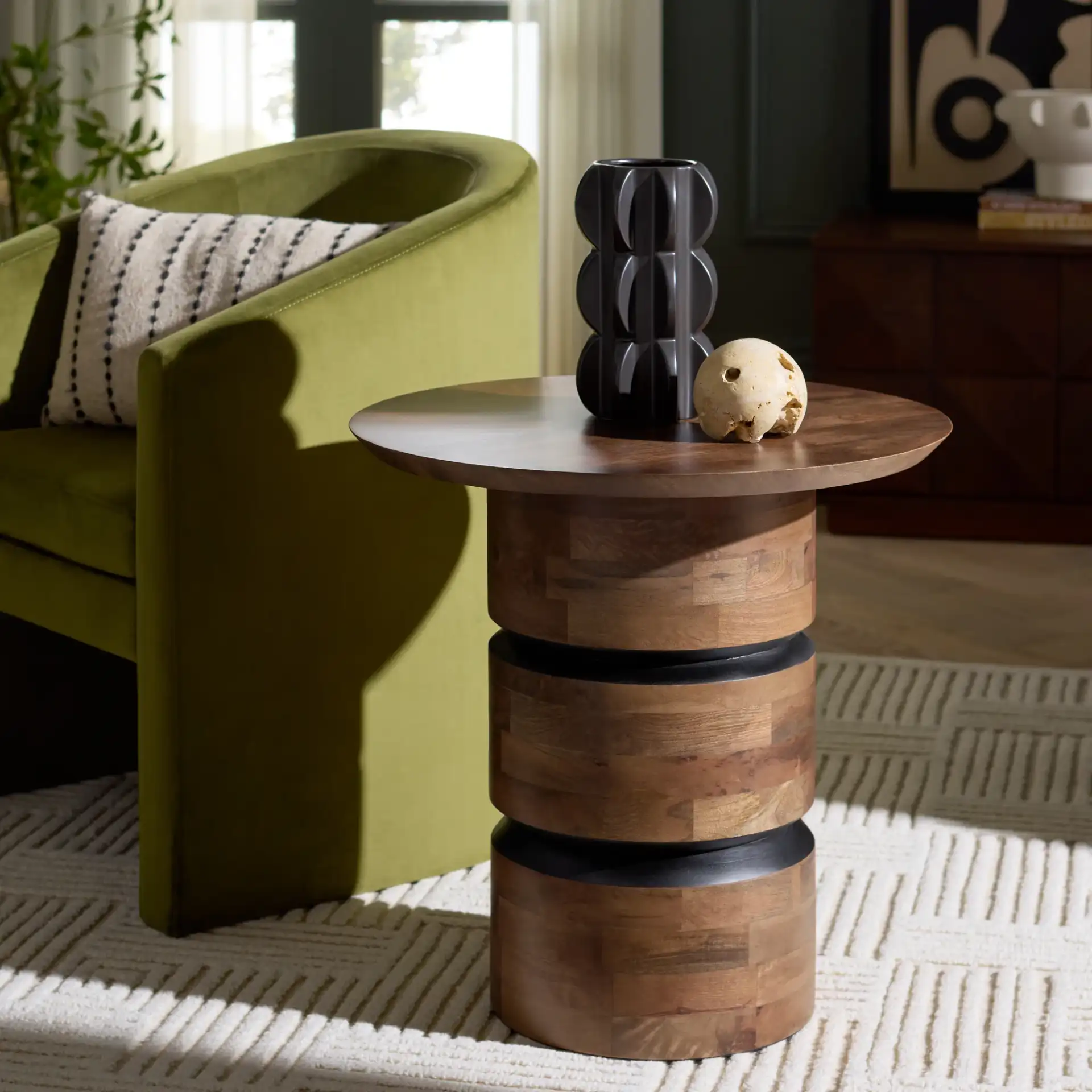 Zorro Round Accent Table in Walnut in a styled room