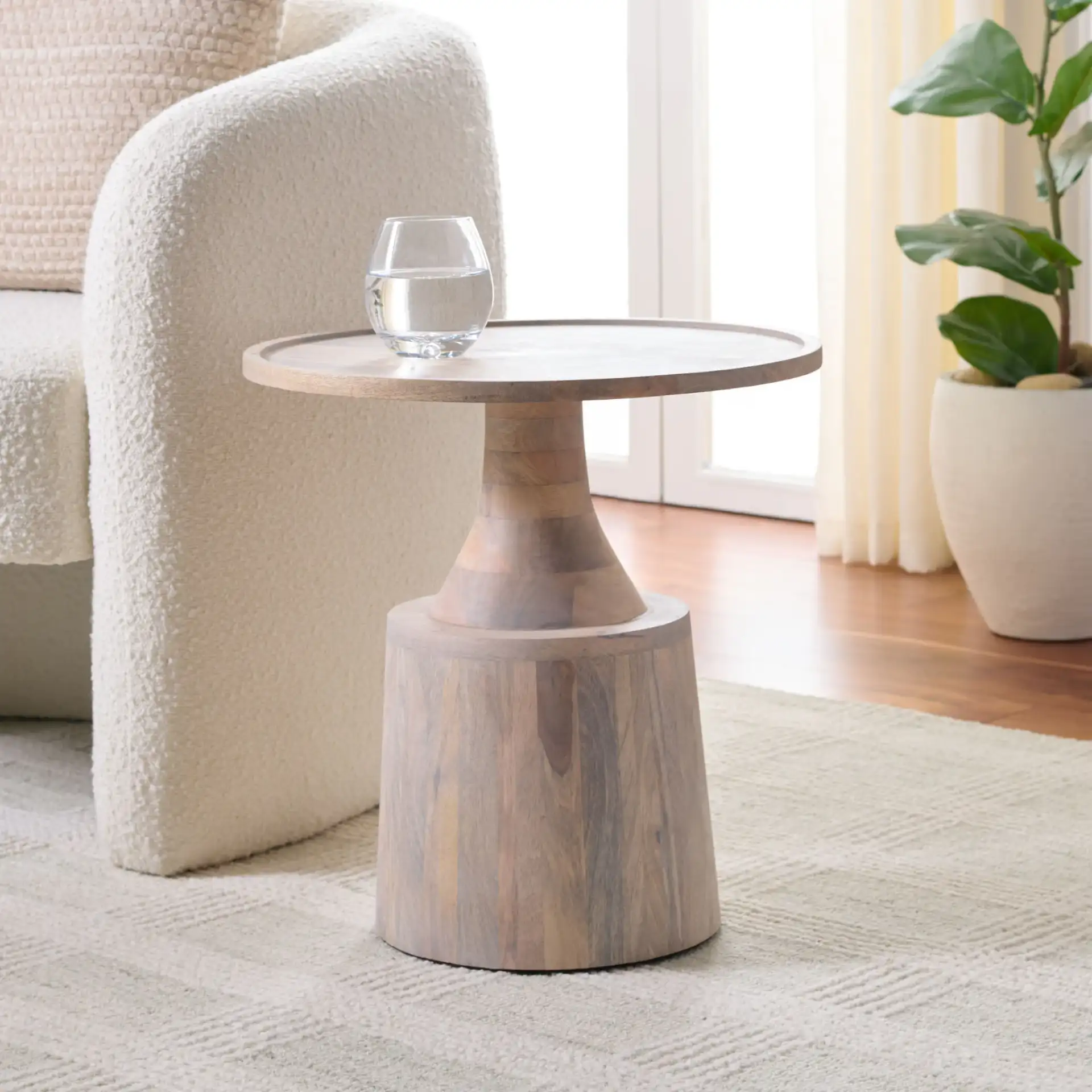 Javier Round Accent Table in White Washed in a styled room