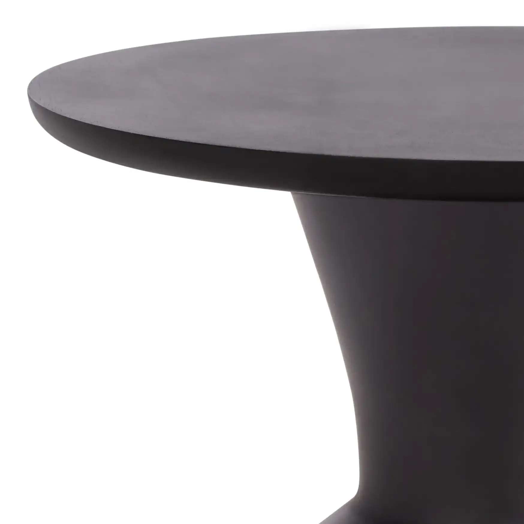 Tazon Round Accent Table in Black in a styled room