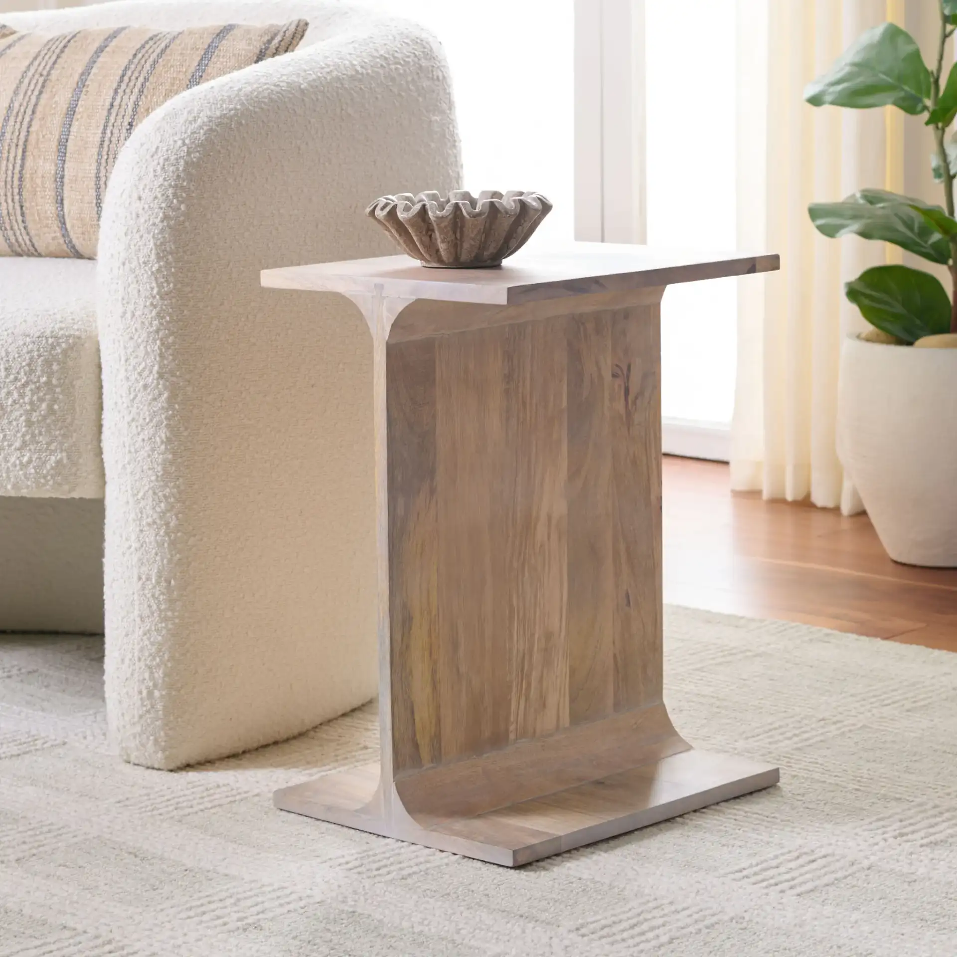 Wilfredo Accent Table in White Washed in a styled room