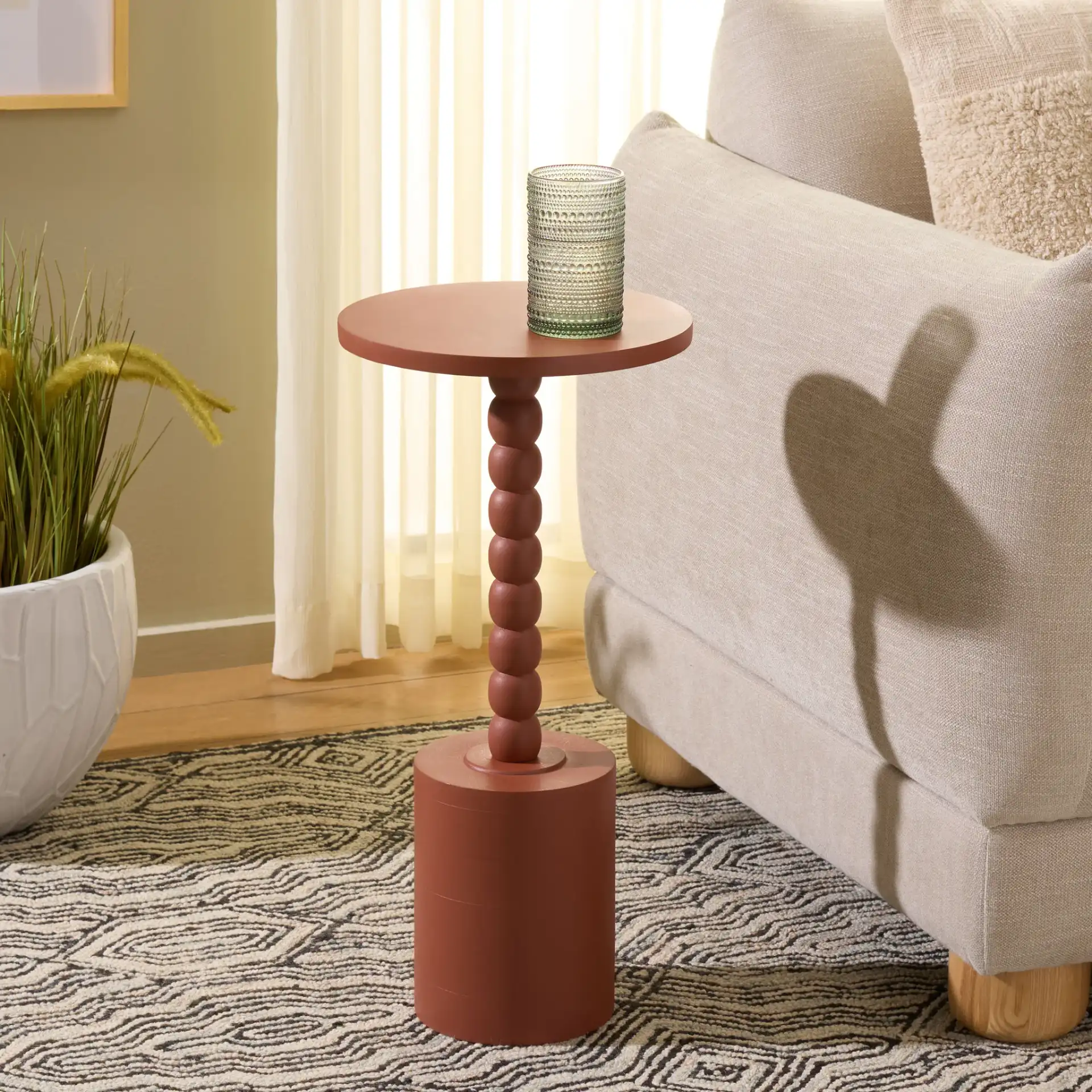 Fern Accent Table in Orange in a styled room