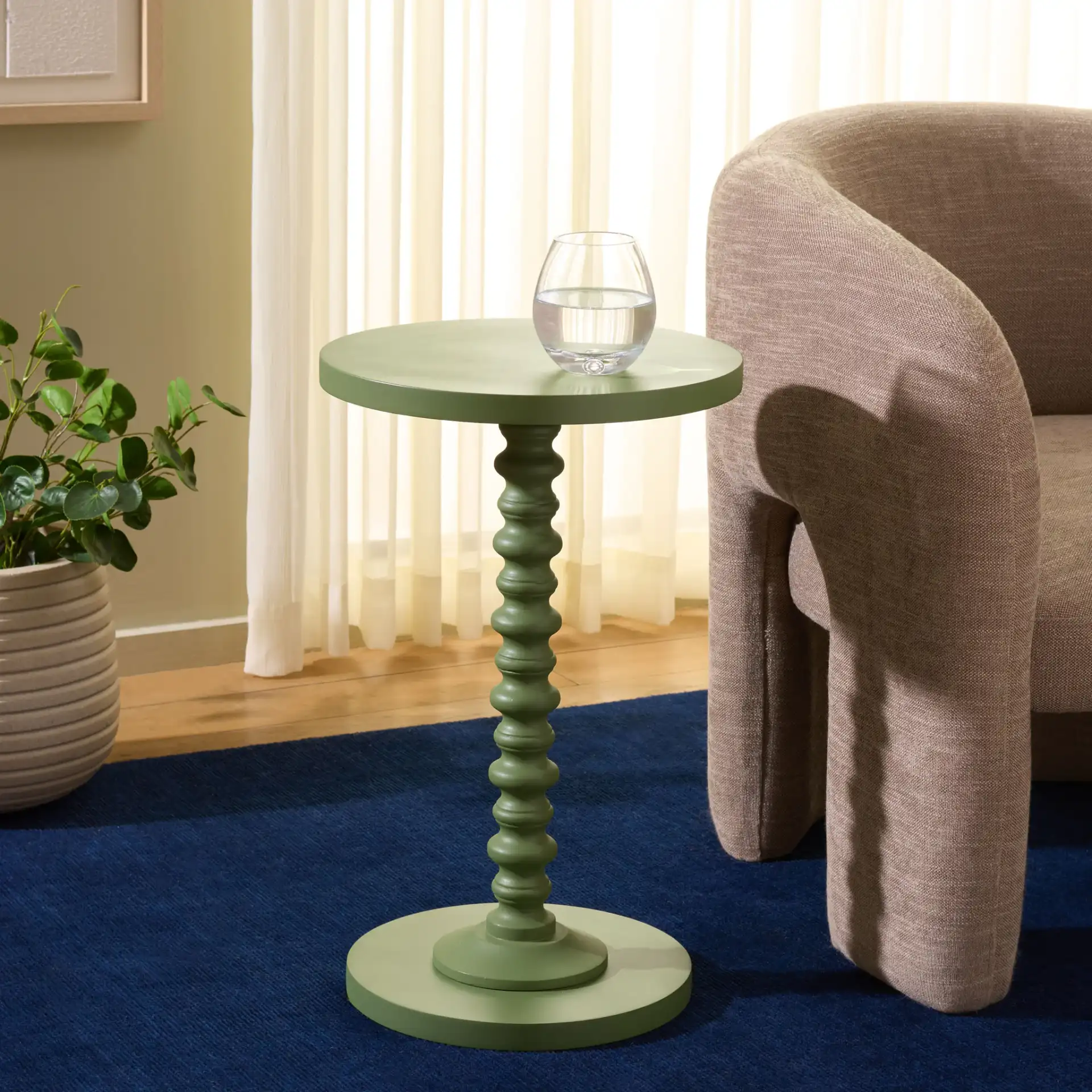 Bonti Accent Table in Green in a styled room
