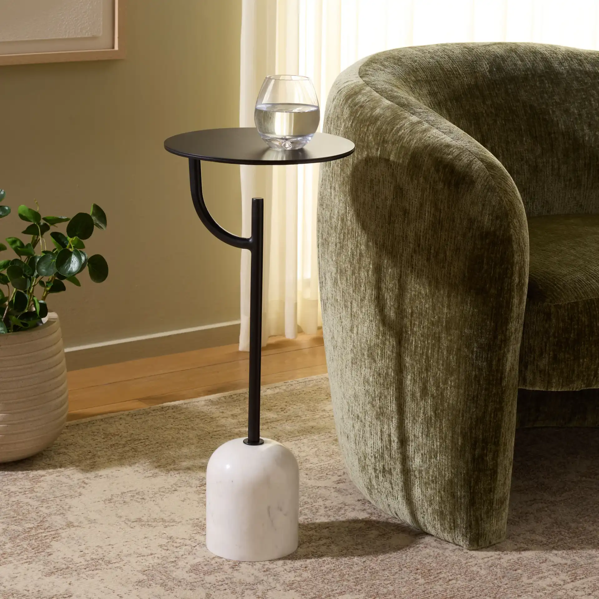 Harlowe Accent Table in Black / White in a styled room