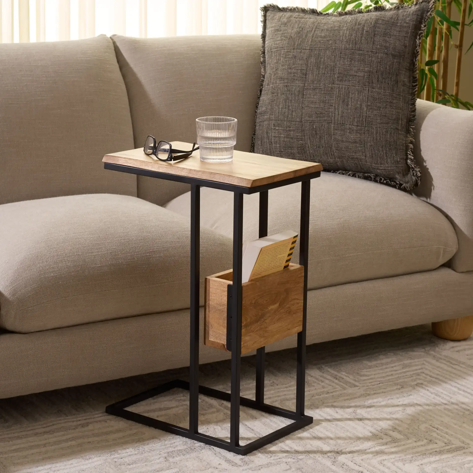 Amirah Accent Table in Natural / Black in a styled room