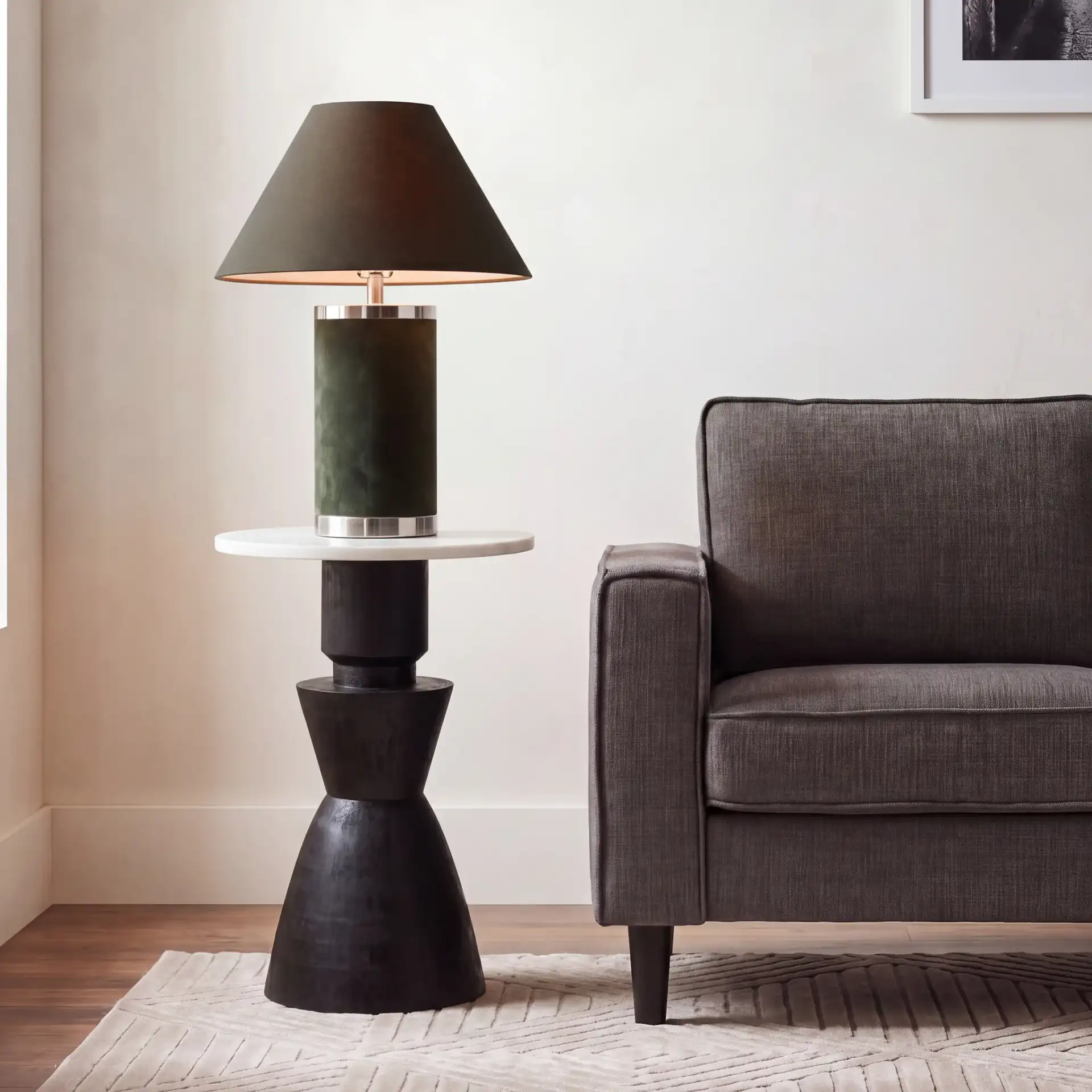 Kyla Accent Table in Black / White in a styled room