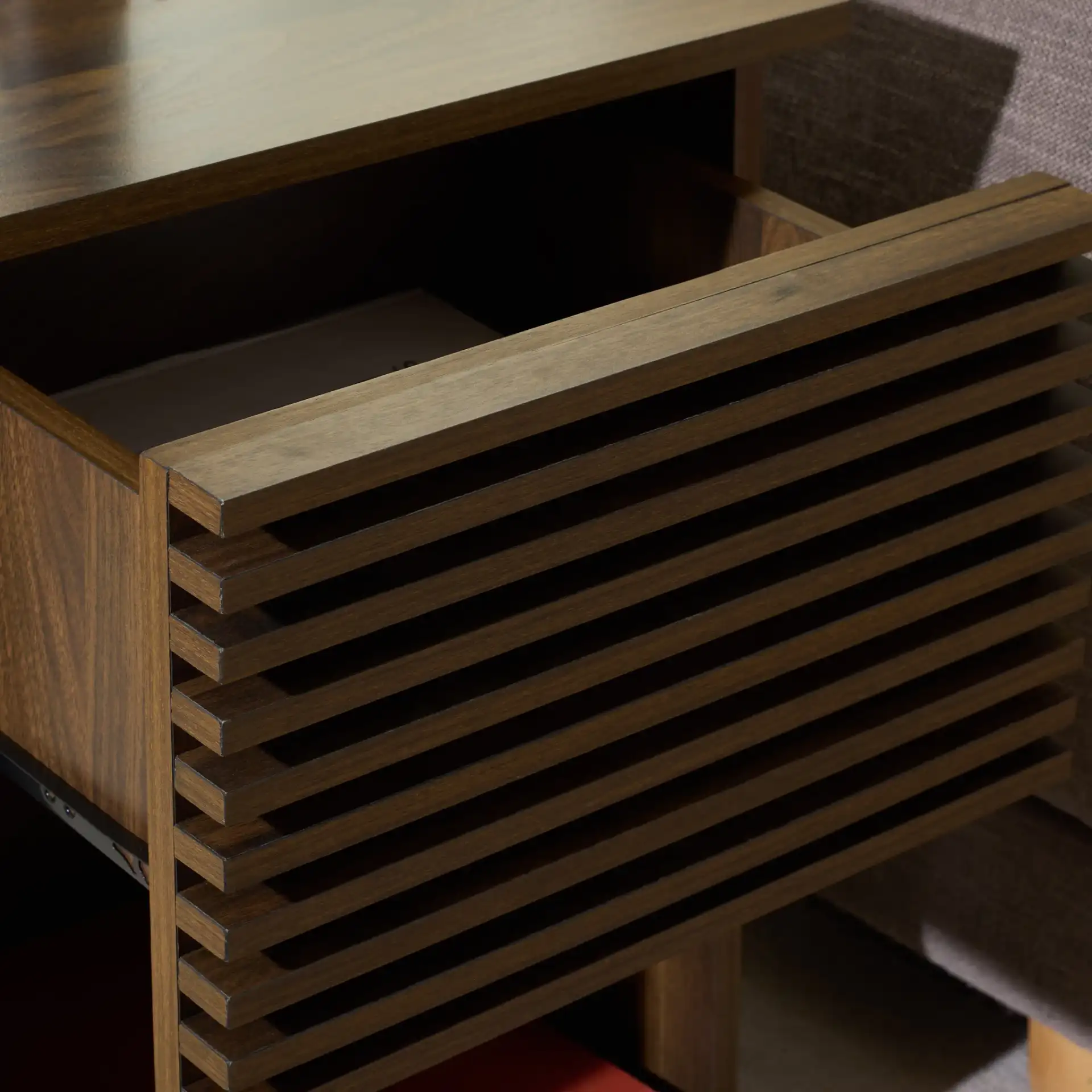 Moroto One-Drawer Accent Table in Walnut in a styled room