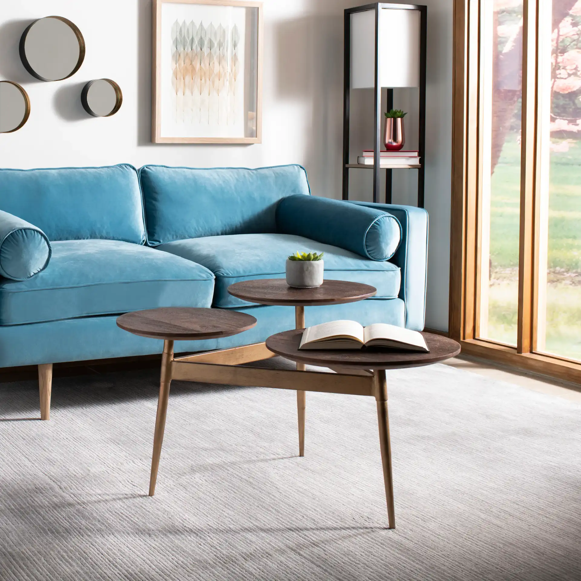 Ian Three-Circle Accent Table in Rustic Honey / Gold in a styled room