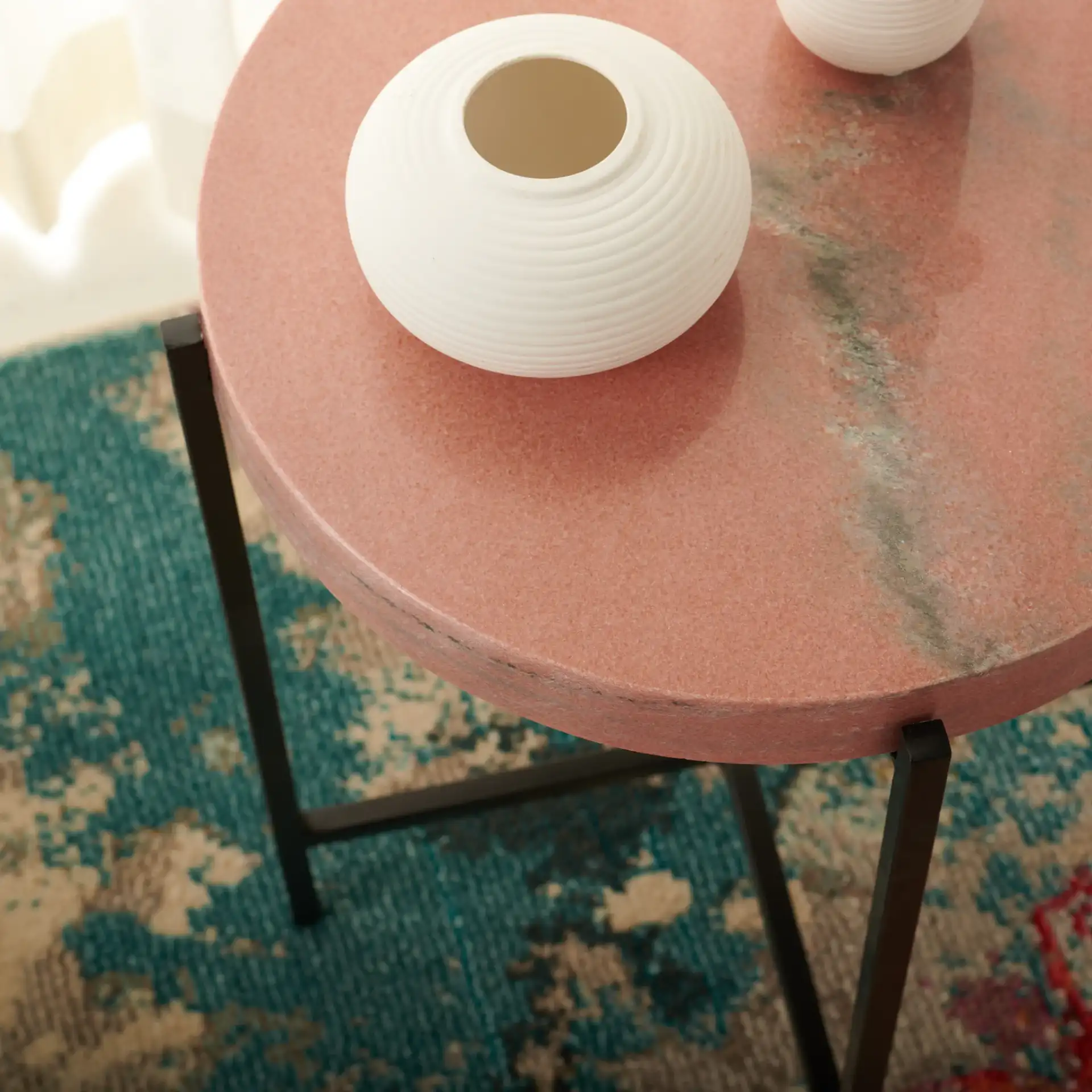 Azula Stone Top Accent Table in Burnt Orange Stone / Black in a styled room