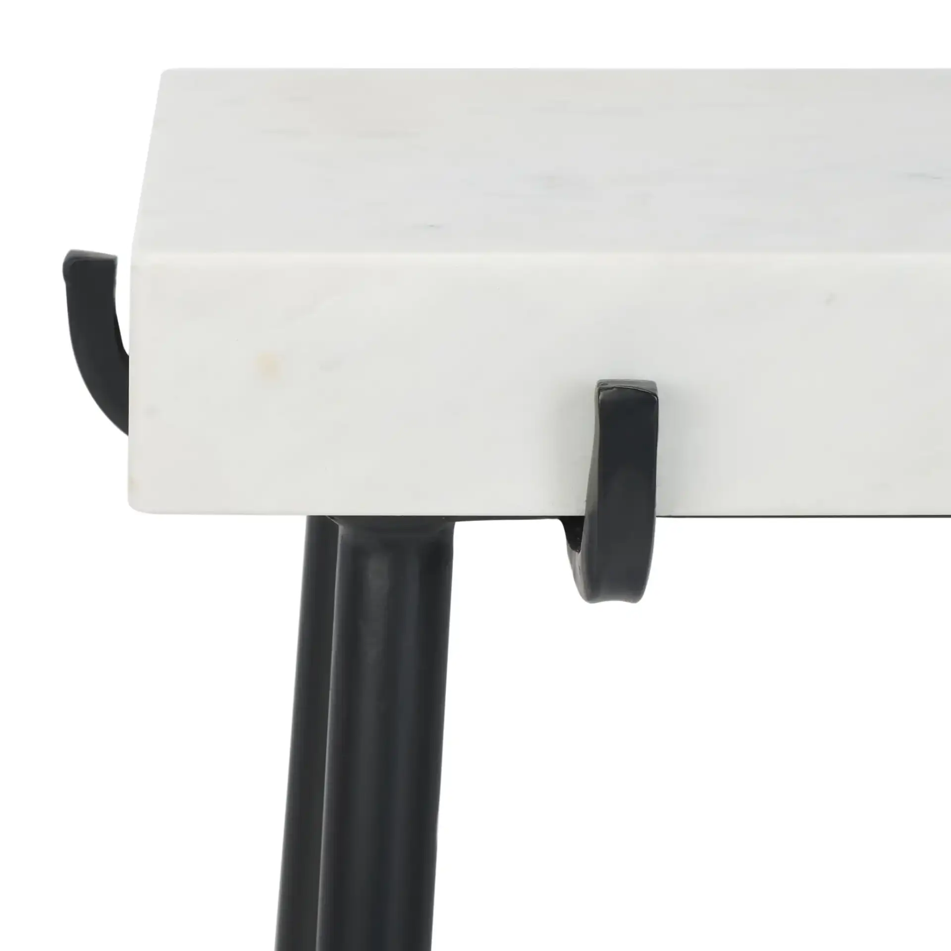 Yuki Stone Top Accent Table in White / Black in a styled room