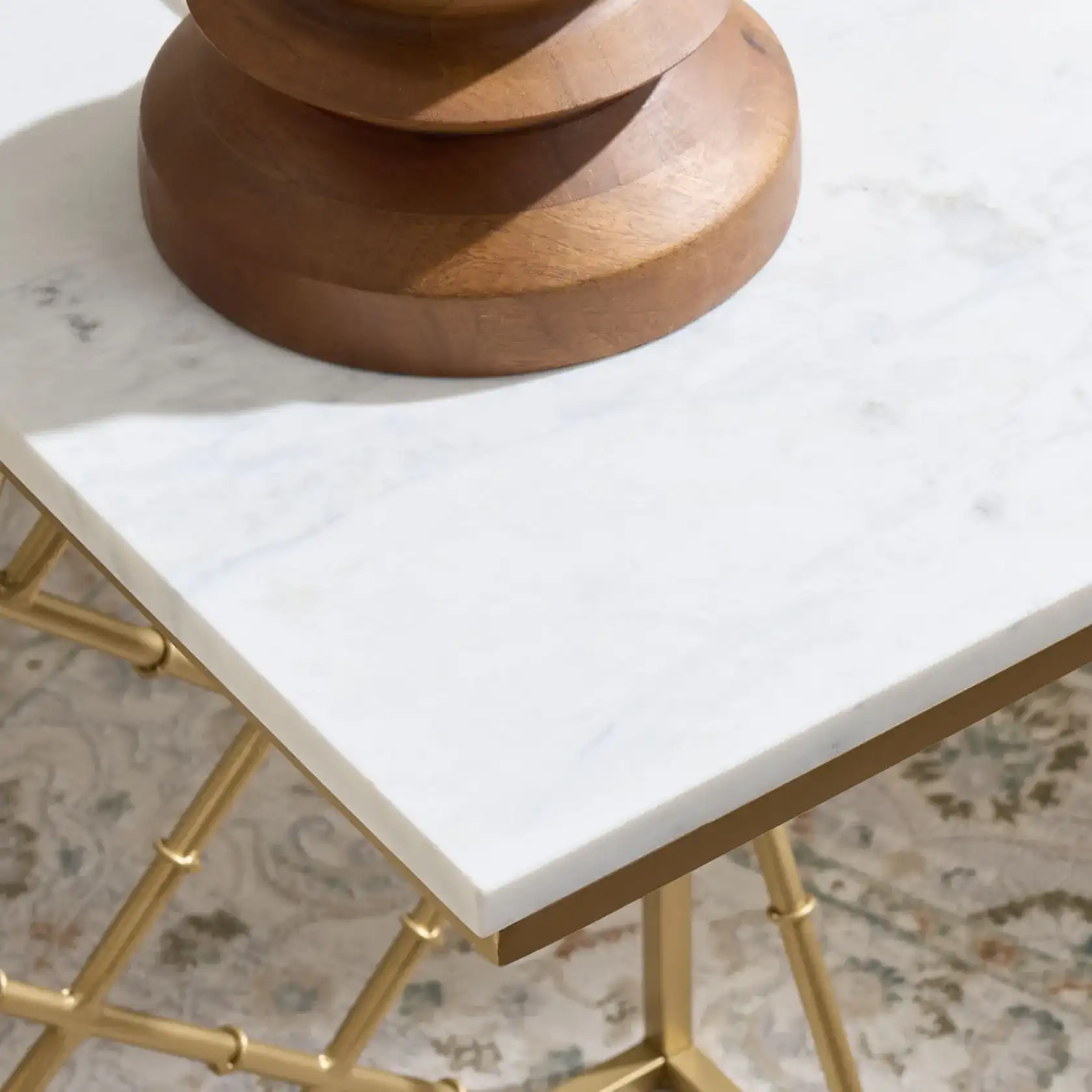 Keston Marble C-Table in White Marble / Gold in a styled room