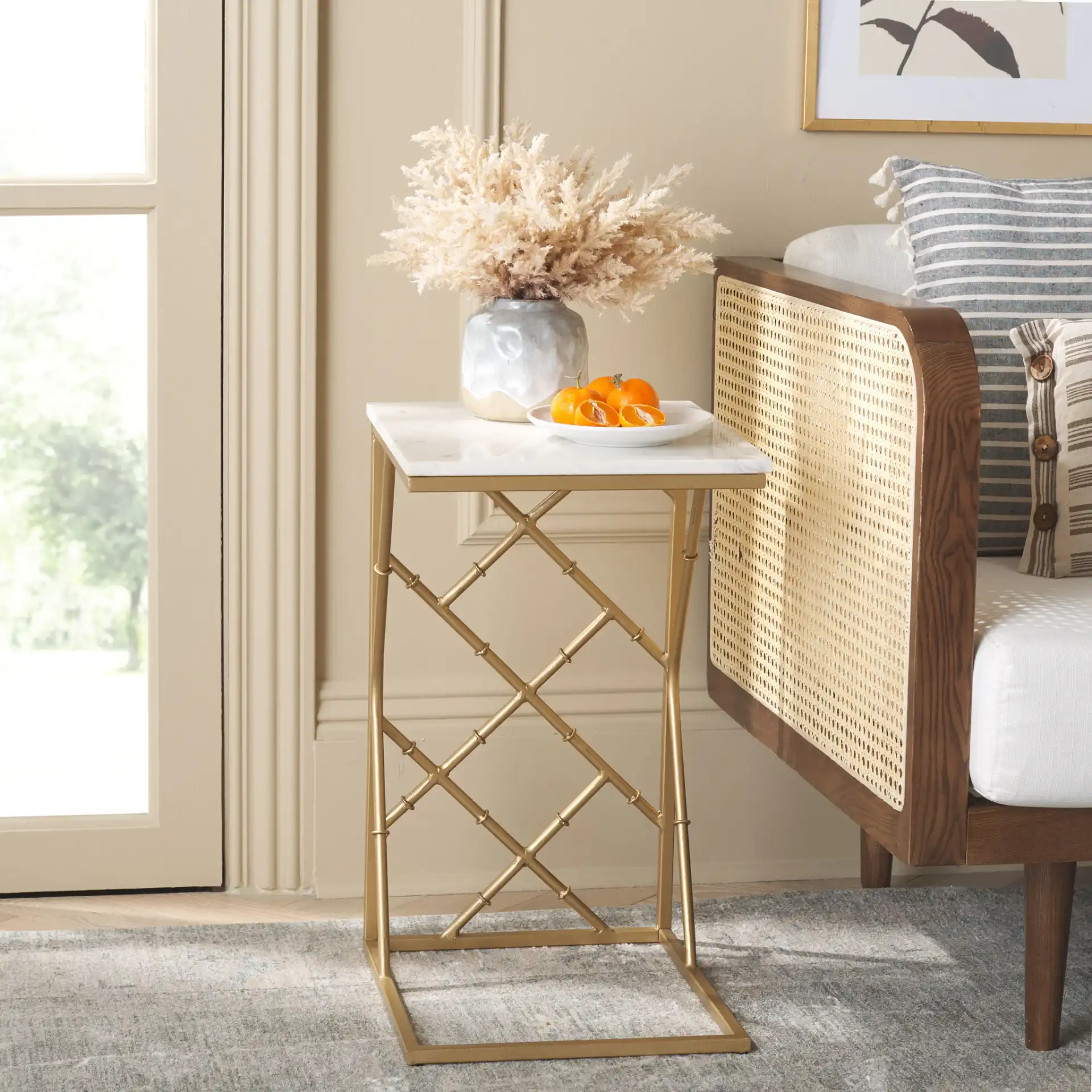 Keston Marble C-Table in White Marble / Gold in a styled room