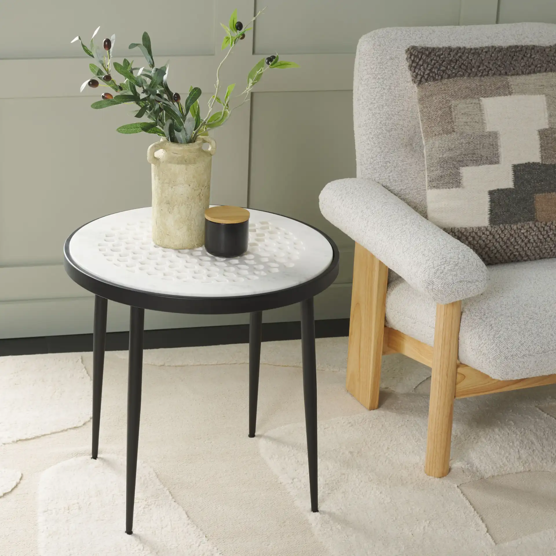 Elly Marble Cnc Side Table in White Marble / Black in a styled room