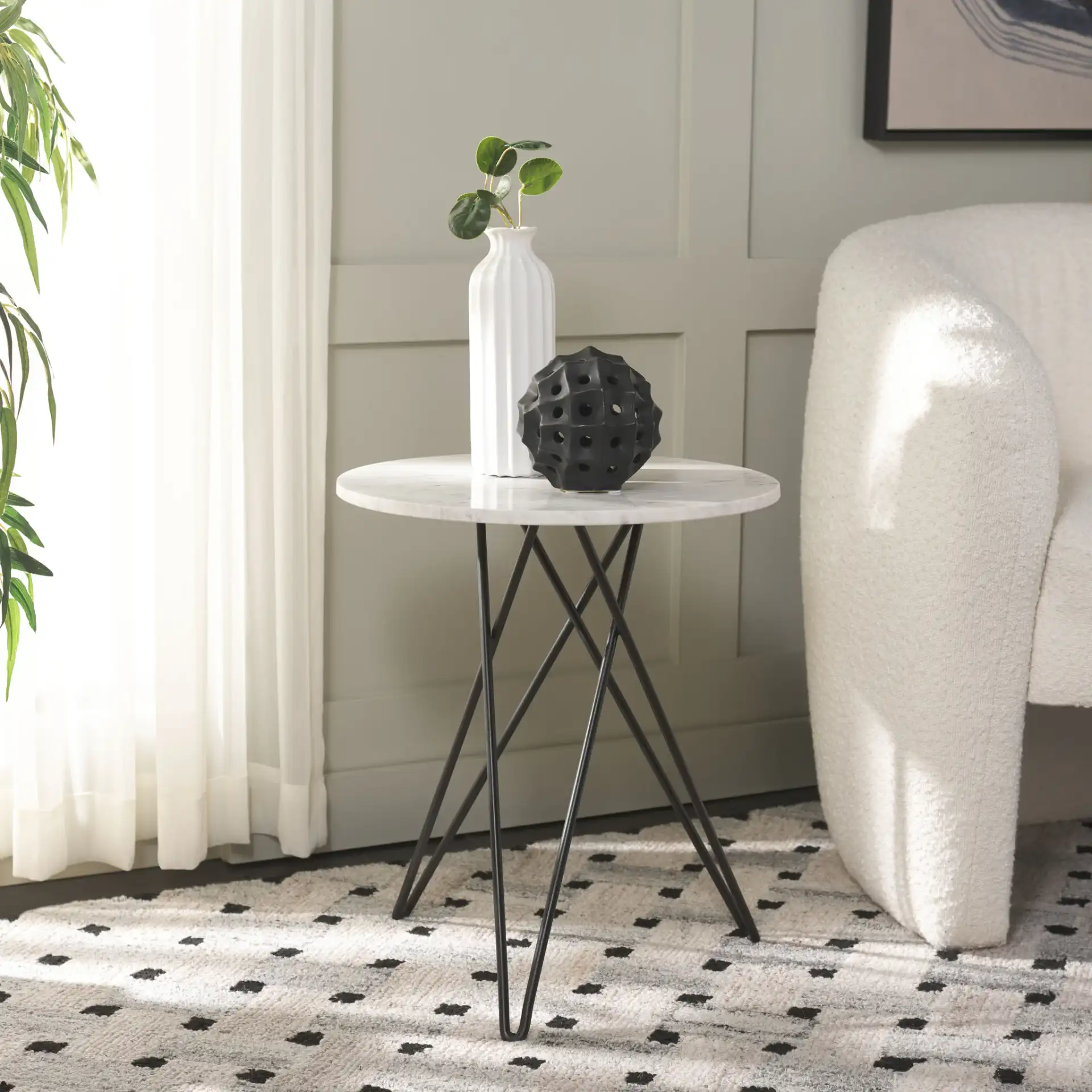 Cade Marble Side Table in White Marble / Black in a styled room