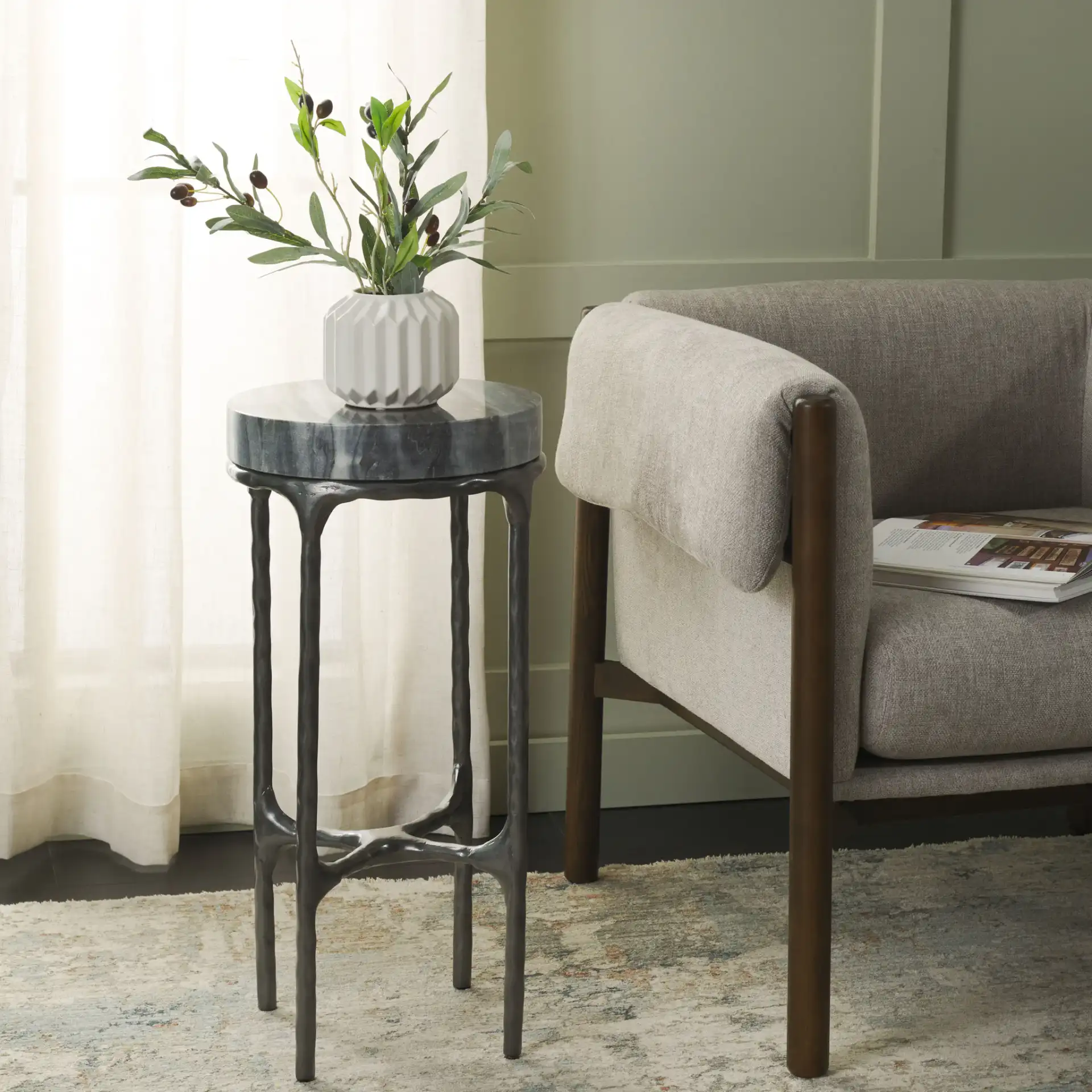 Castiel Hammered Side Table in Gray Marble in a styled room