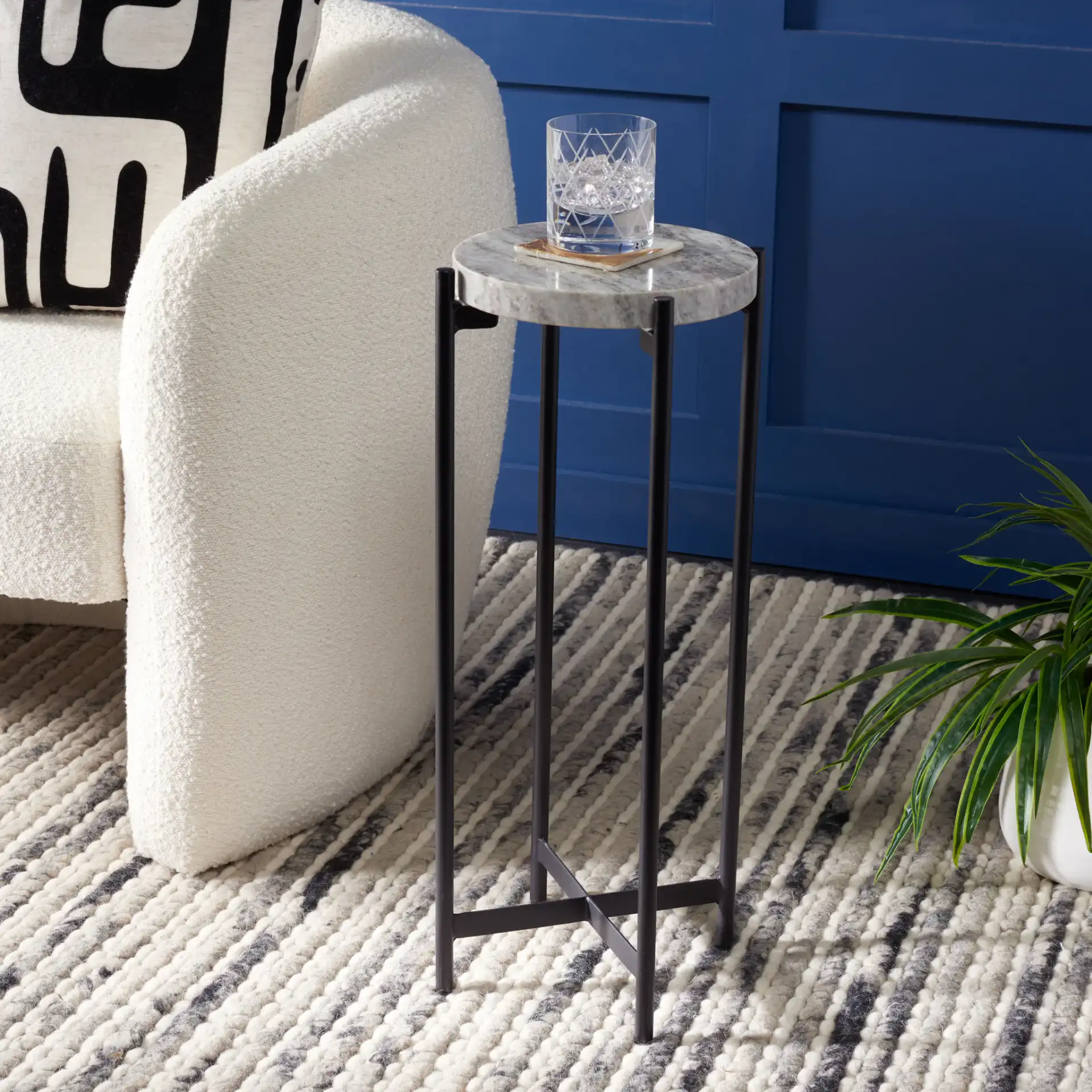 Hames Drink Table in Sand Brown Marble / Black in a styled room