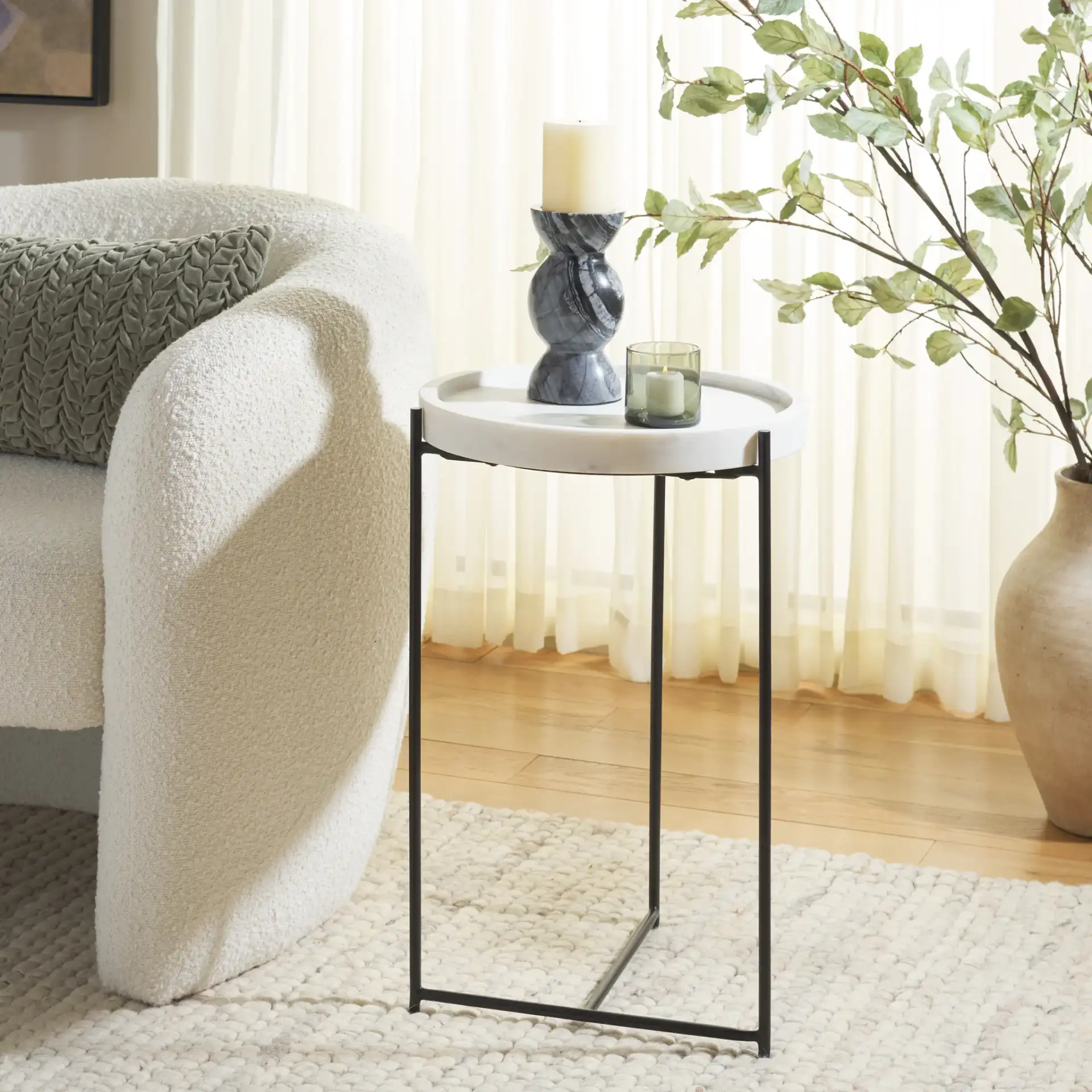 Bavaria Marble Side Table in White / Black in a styled room